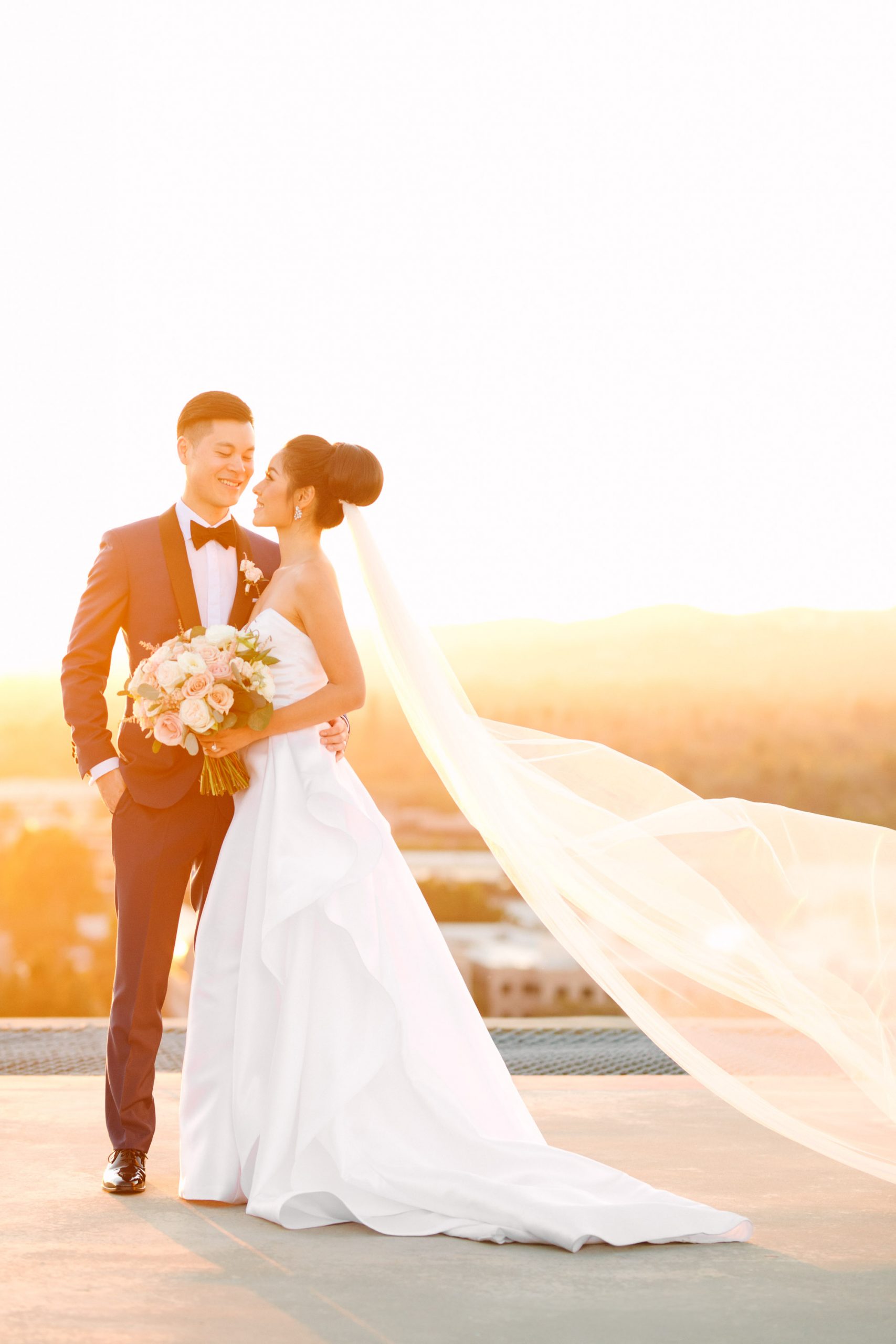 Bride and groom on rooftop at Beverly Hills Four Seasons by Mary Costa Photography
