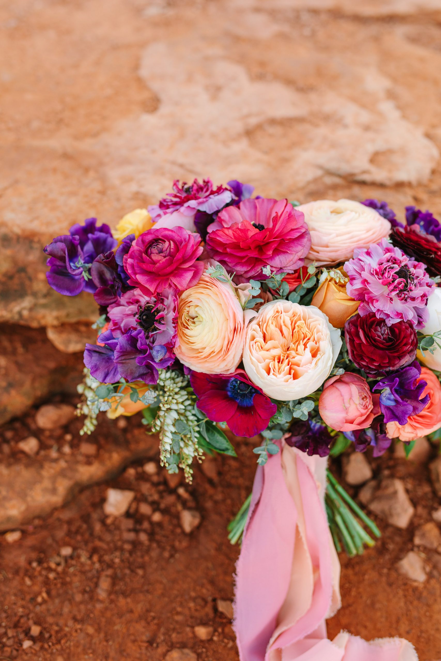 Bold Sedona wedding bouquet by Mary Costa Photography