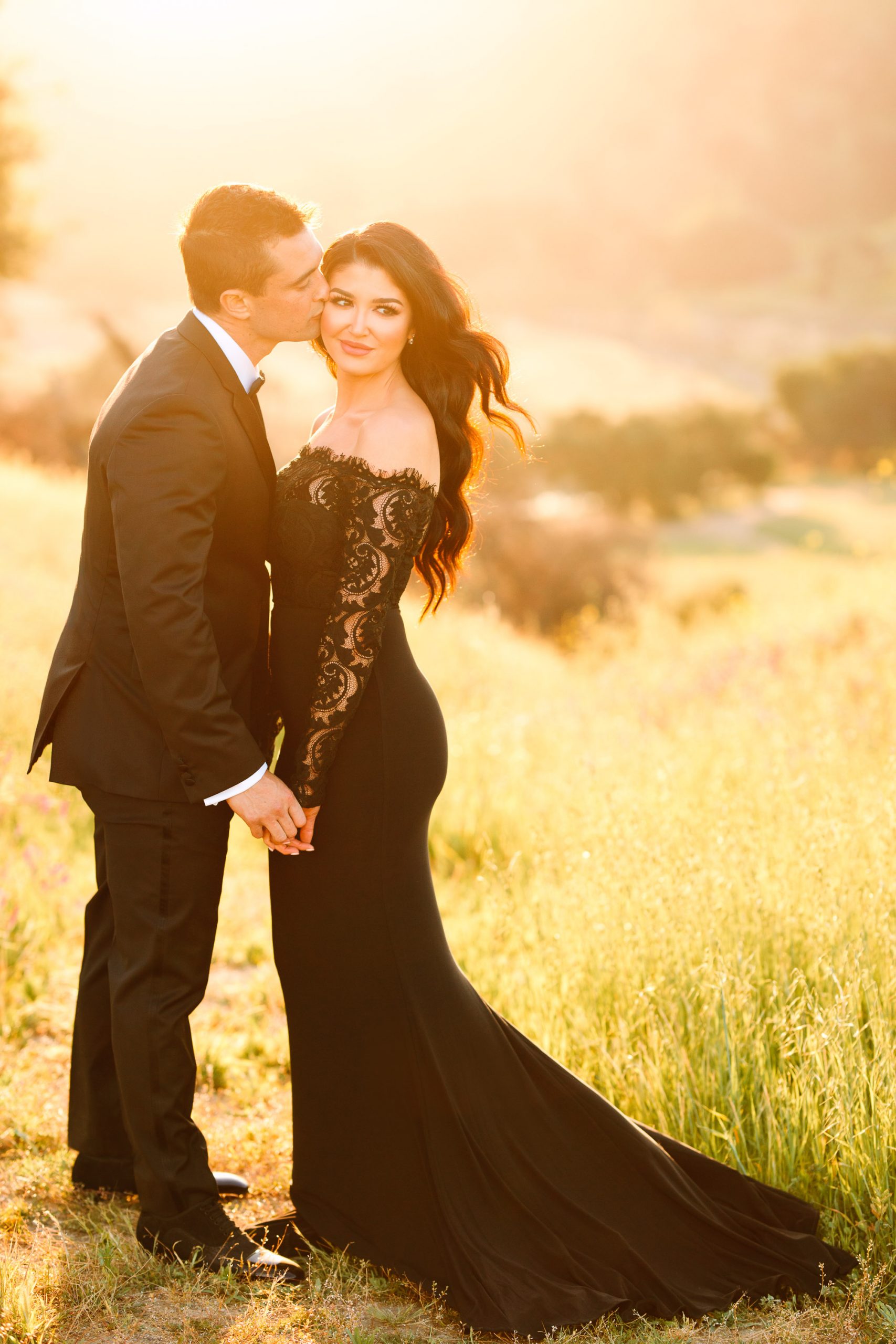 Couple in black tie attire by Mary Costa Photography