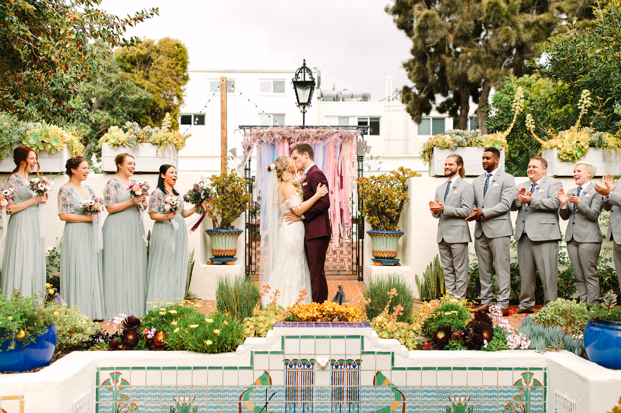 Wedding ceremony first kiss at Darlington House La Jolla by Mary Costa Photography