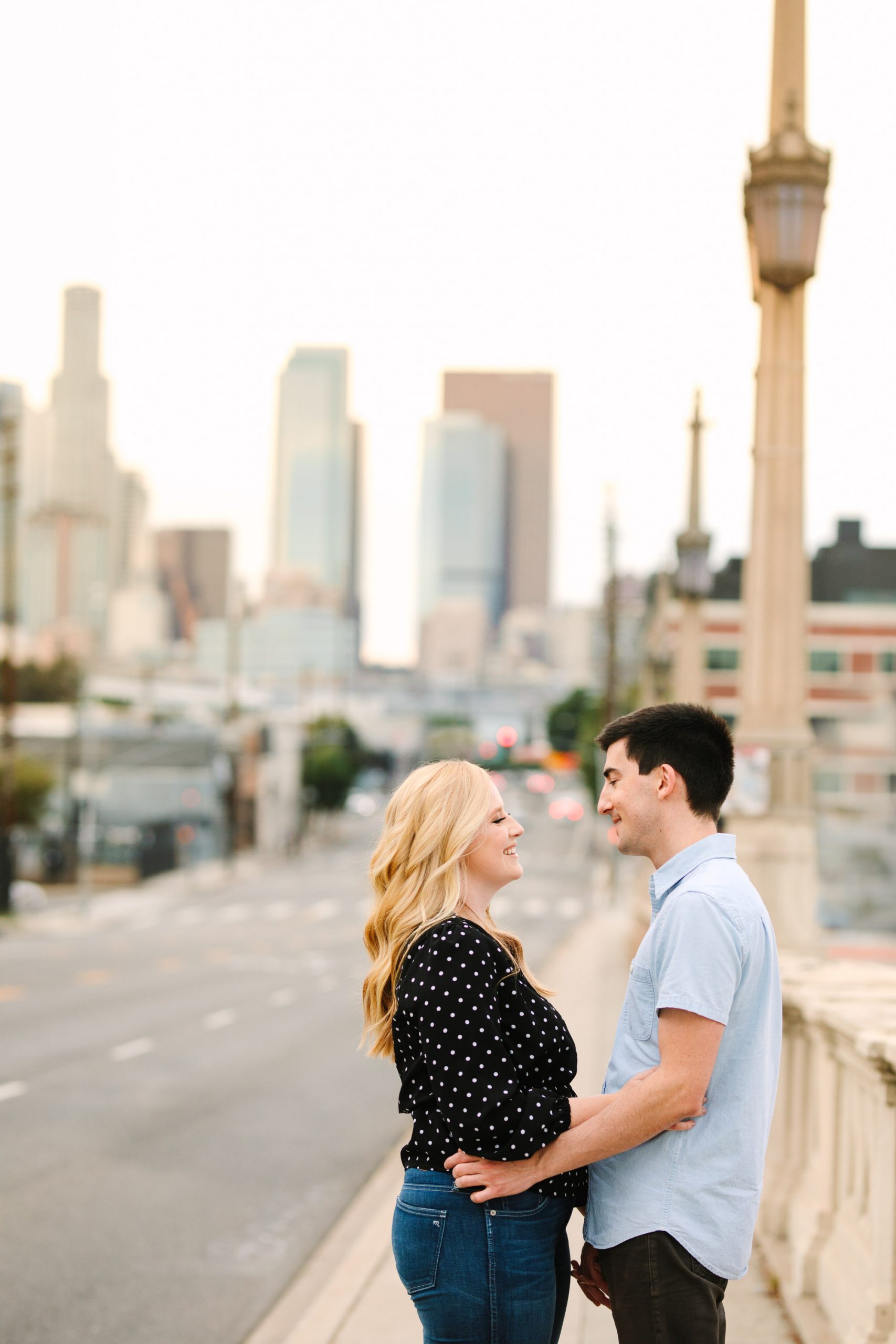 Couple w DTLA skyline Indian Fusion wedding at Fig House Los Angeles by Mary Costa Photography