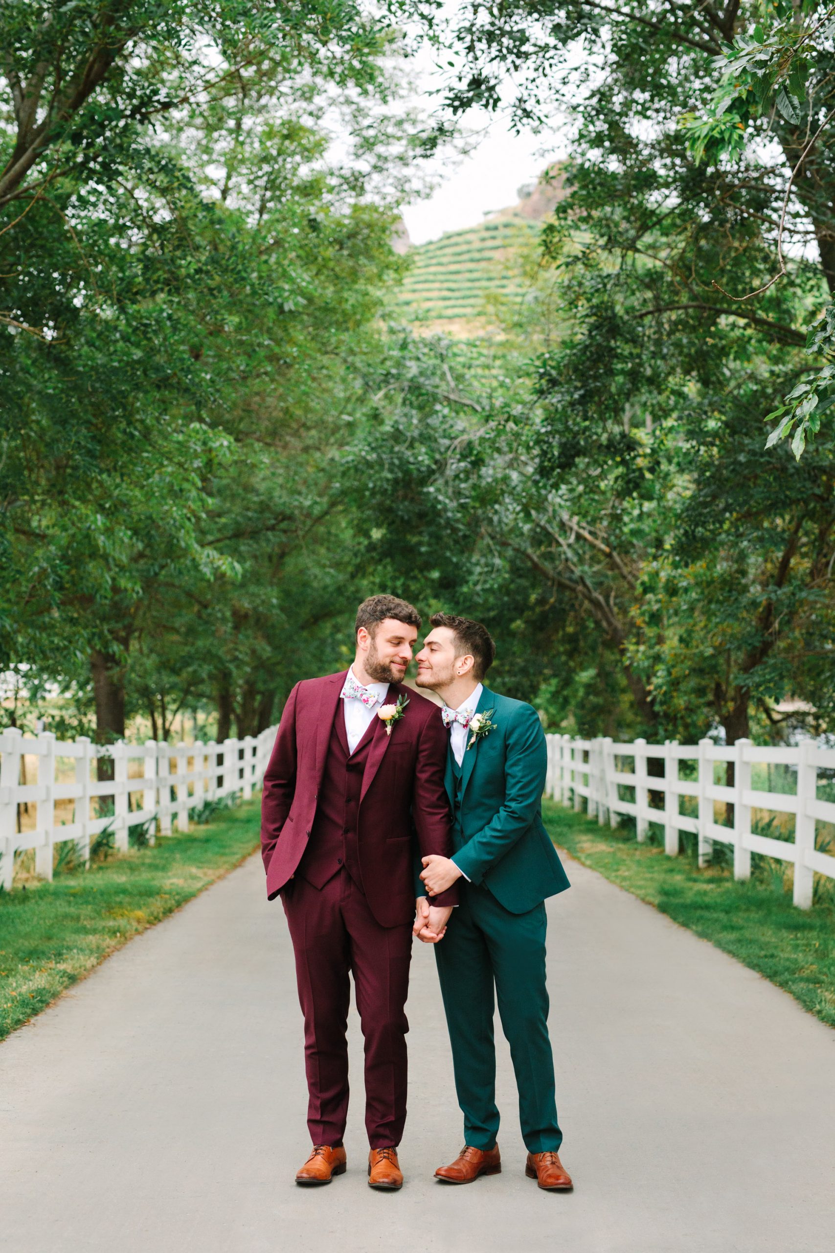 Two grooms by by Mary Costa Photography