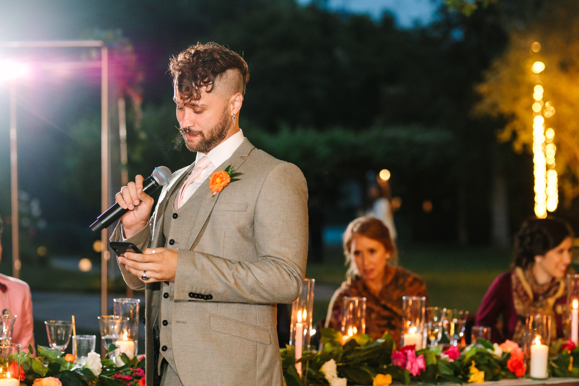 Best man giving speech by Mary Costa Photography