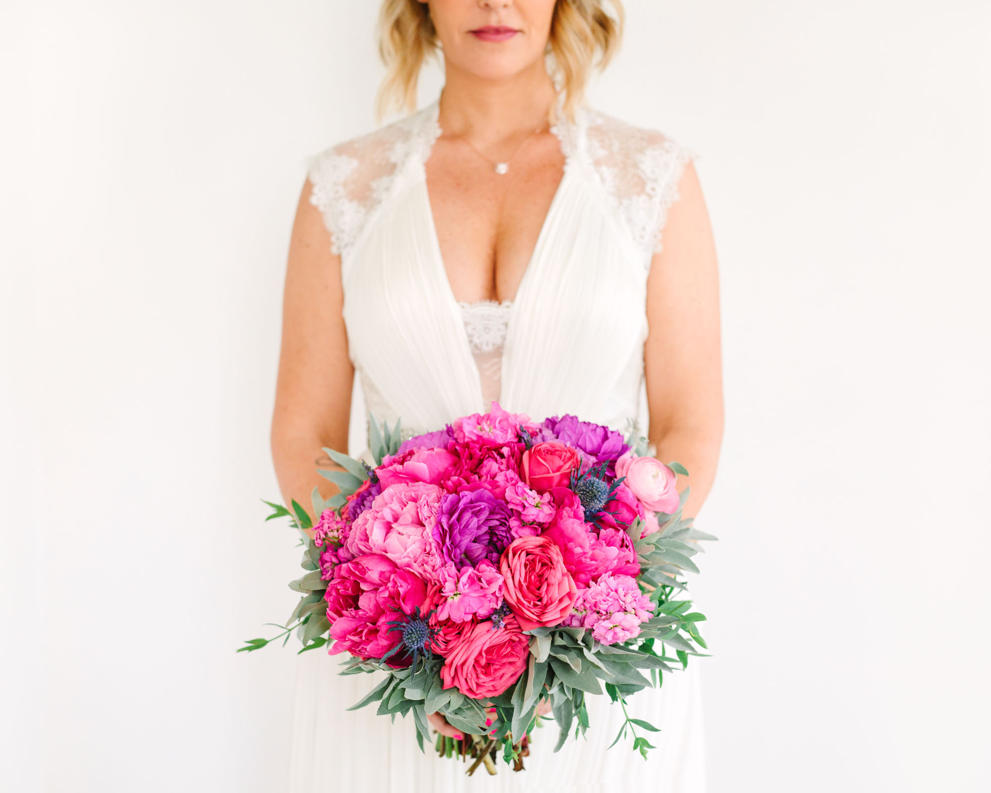 Bride with colorful bouquet at Ruby Street Los Angeles www.marycostaweddings.com