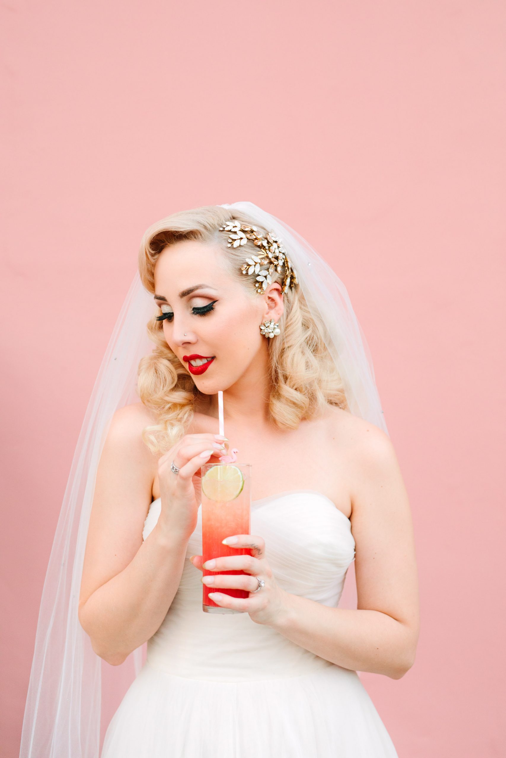 Bride with custom cocktail at pink Sands Hotel www.marycostaweddings.com
