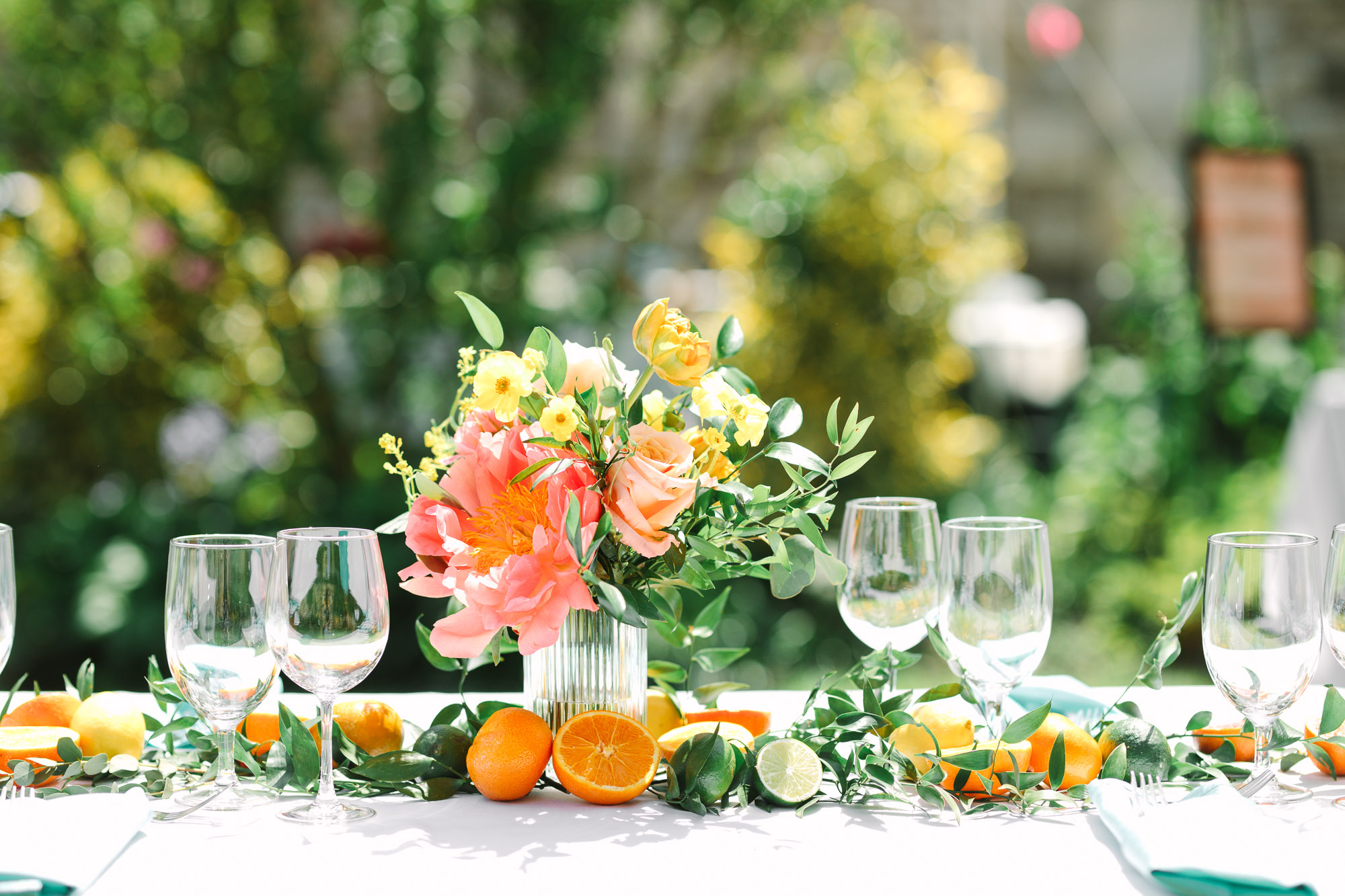 Citrus and flowers at luncheon wedding
