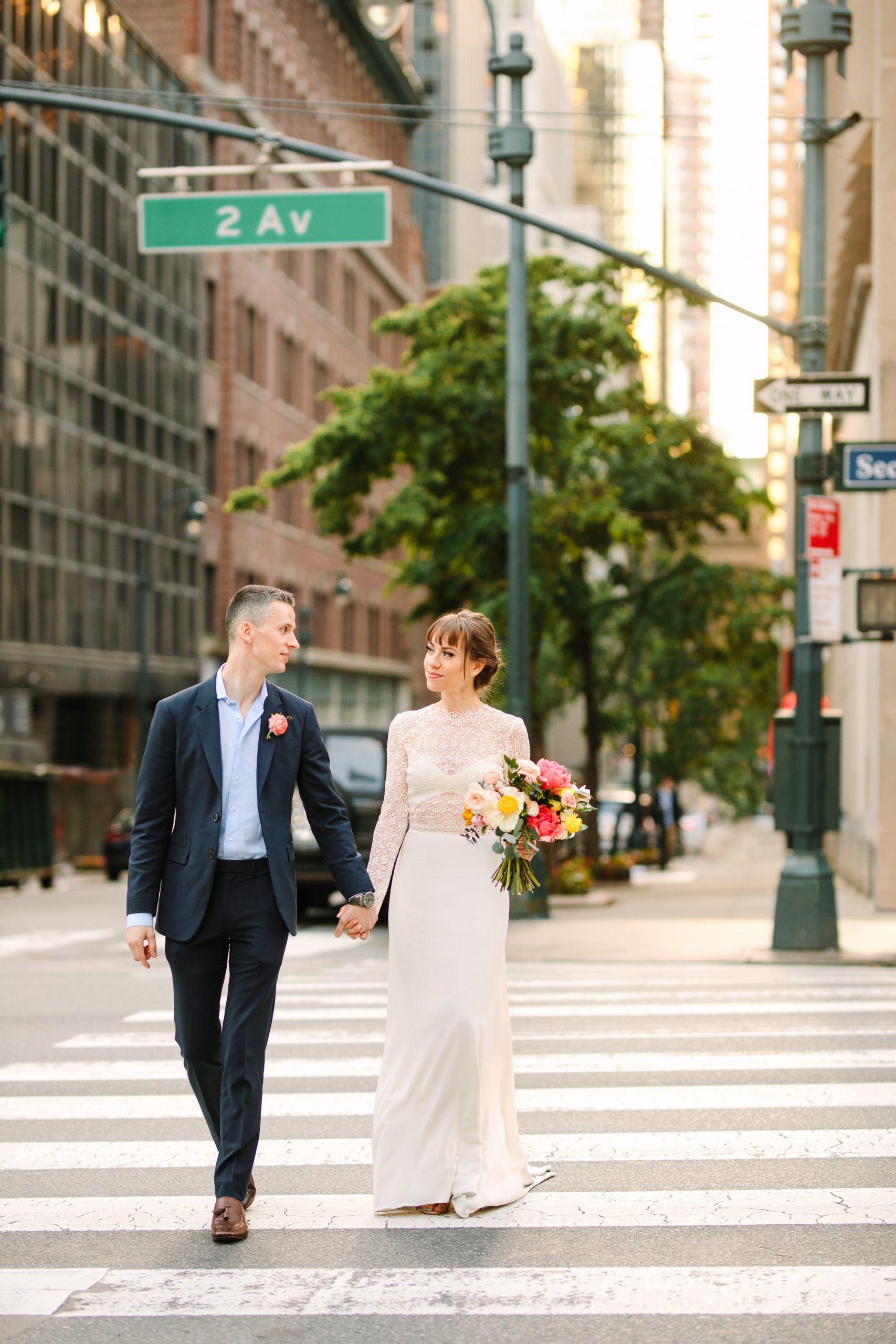Bride and groom crossing the NYC street - www.marycostaweddings.com