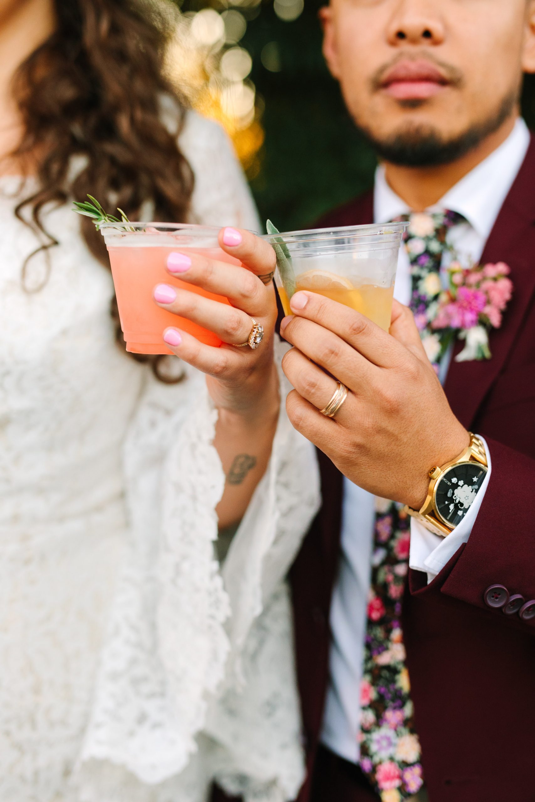 Bride and groom with cocktails and wedding rings - www.marycostaweddings.com