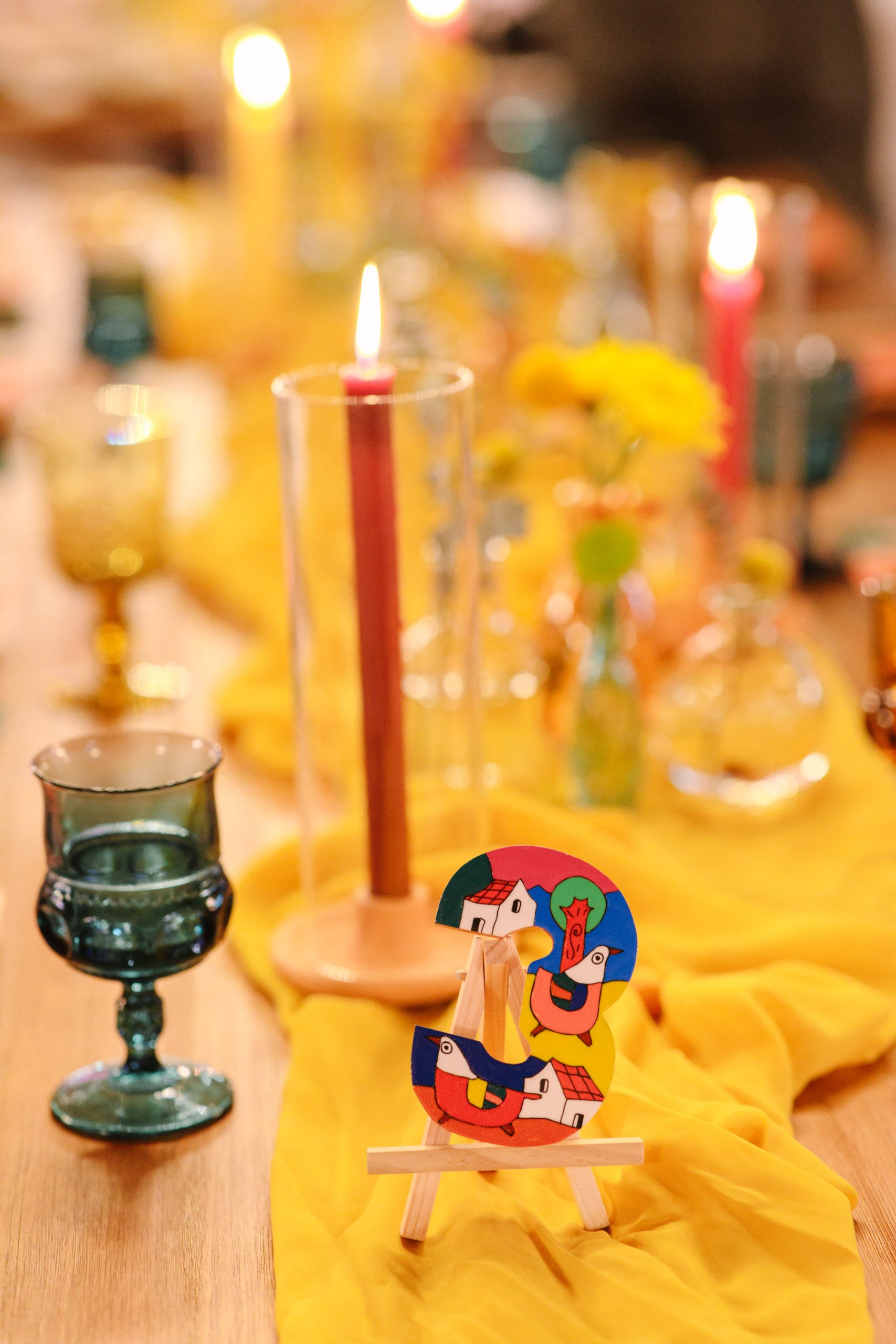 Colorful Mexican-inspired table number - www.marycostaweddings.com