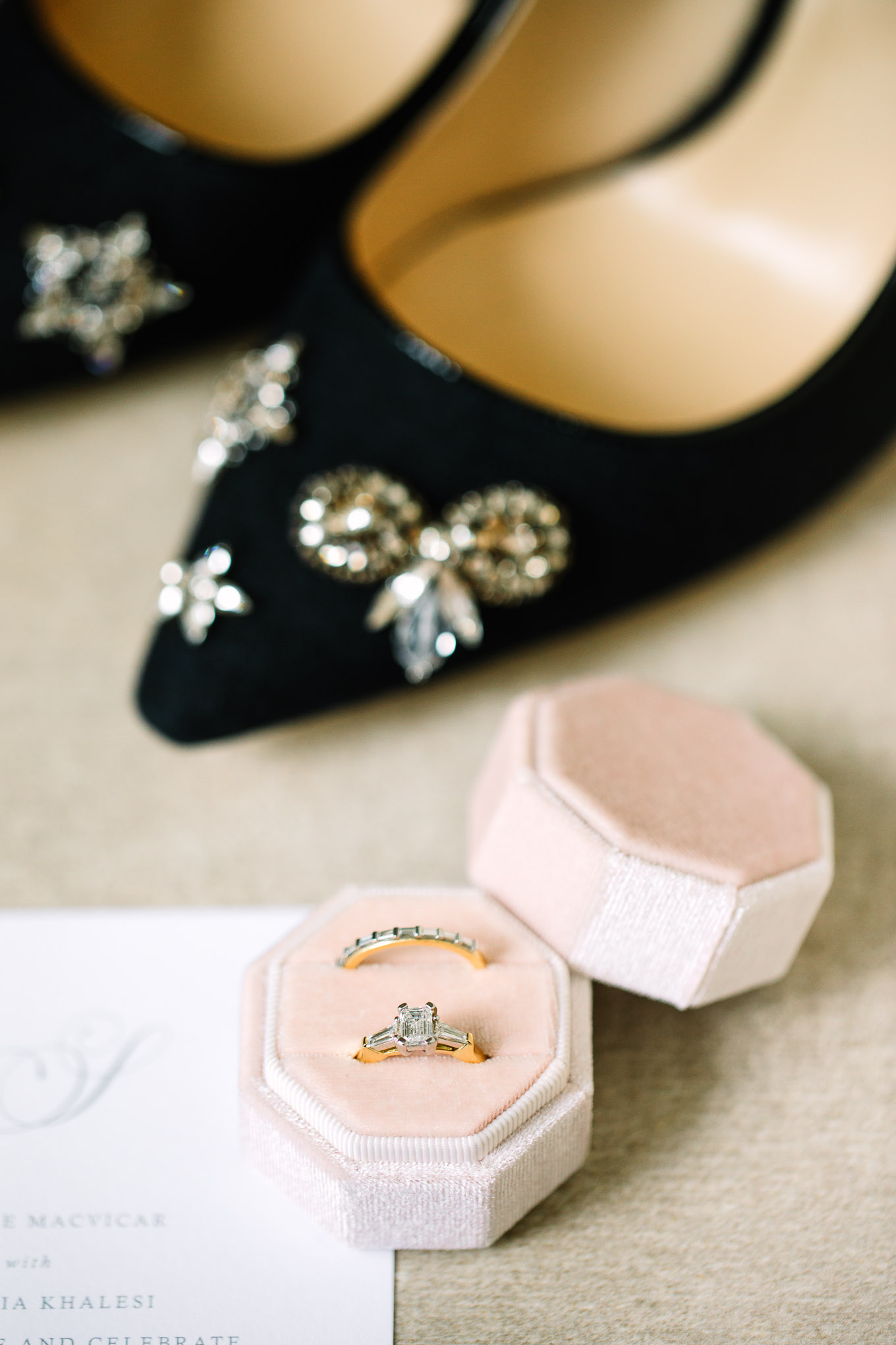 Wedding rings in pink velvet ring box with Jimmy Choo navy embellished pumps. Millbrook Resort Queenstown New Zealand wedding by Mary Costa Photography | www.marycostaweddings.com