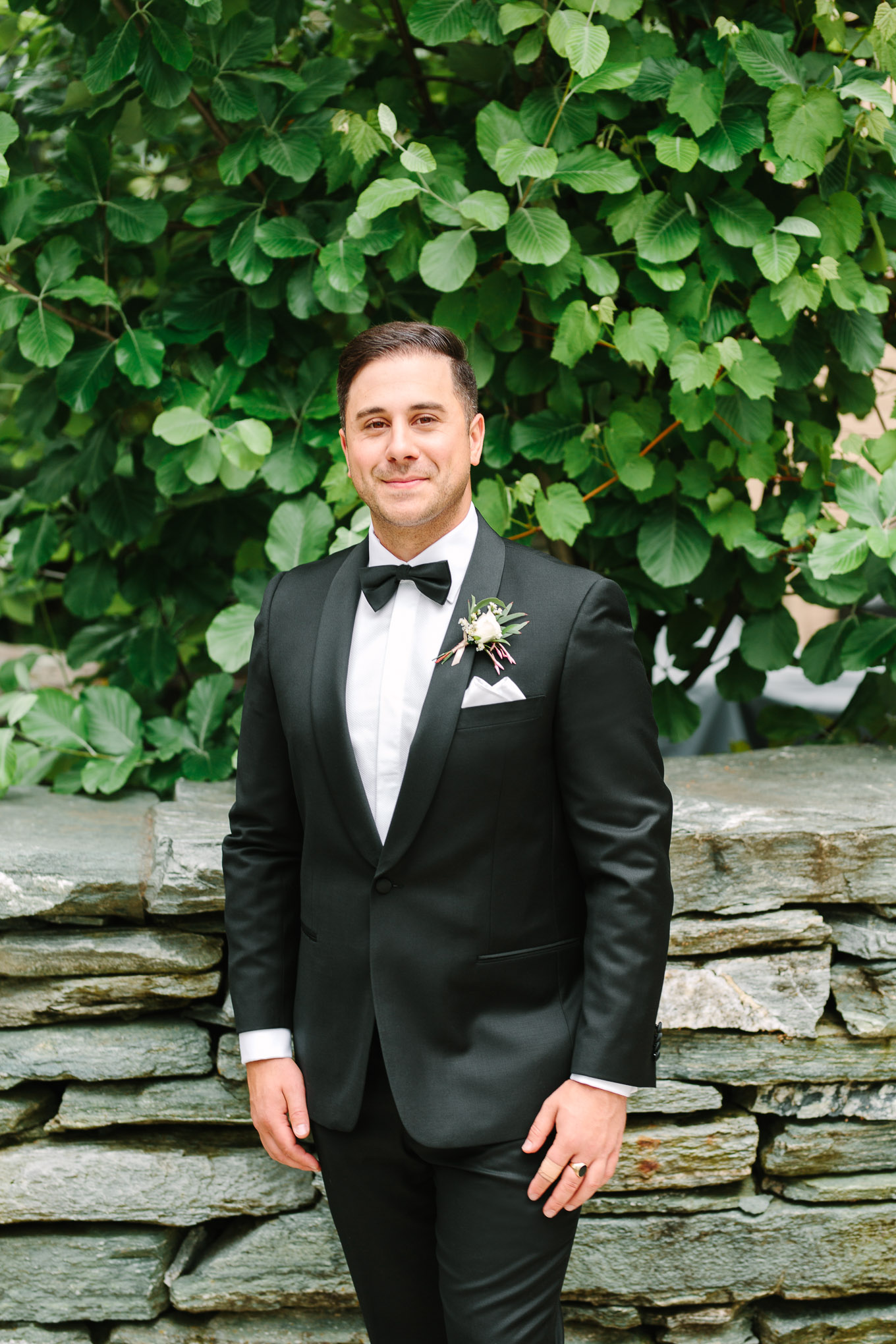 Groom in classic black tuxedo at Millbrook Resort Queenstown New Zealand wedding by Mary Costa Photography | www.marycostaweddings.com