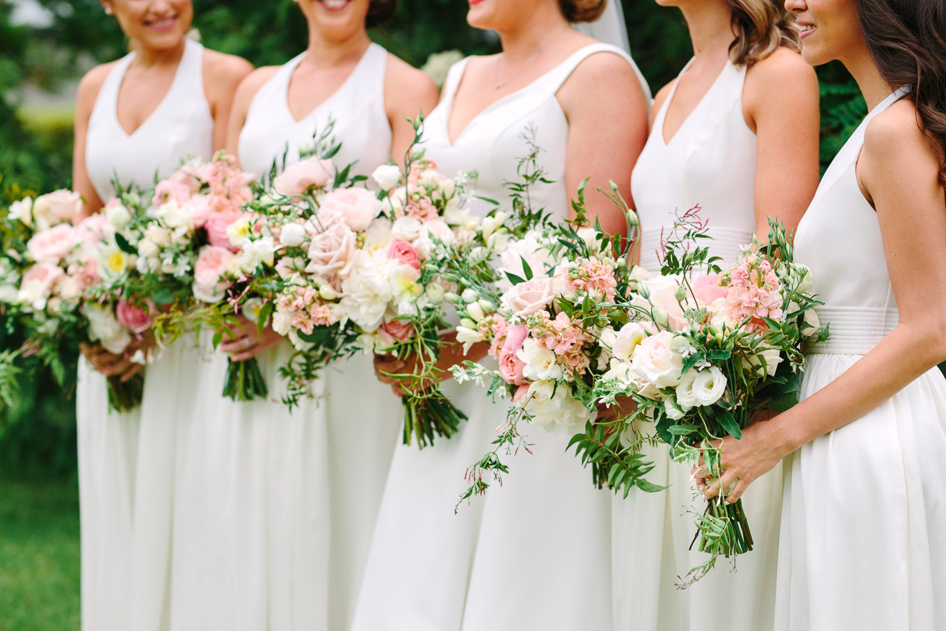 Pink and neutral wedding bouquets and bridal party in white. Beautiful light pink and neutral bridal bouquet. Millbrook Resort Queenstown New Zealand wedding by Mary Costa Photography | www.marycostaweddings.com