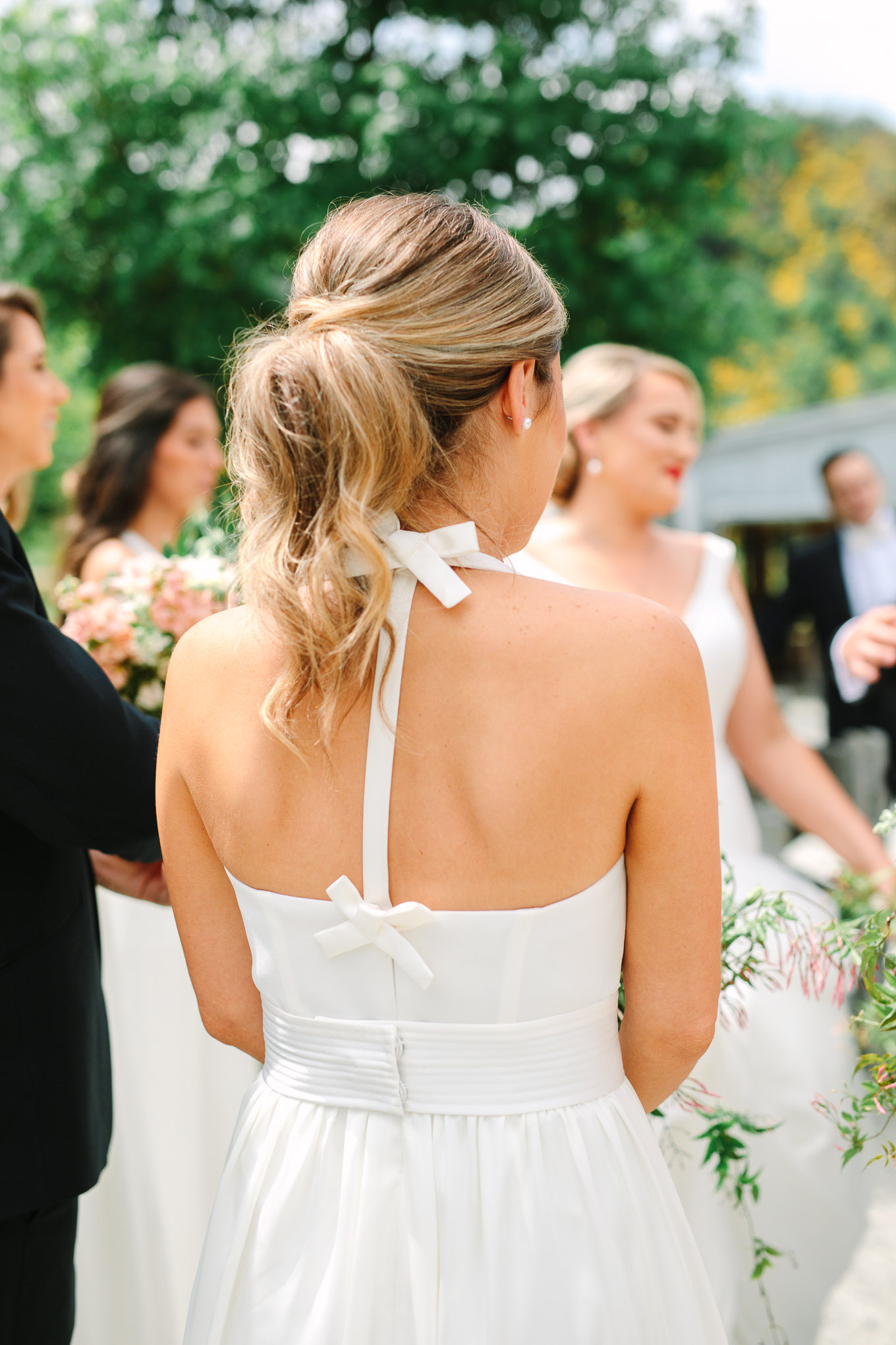 Bow back detail on bridesmaids' dress. Millbrook Resort Queenstown New Zealand wedding by Mary Costa Photography | www.marycostaweddings.com