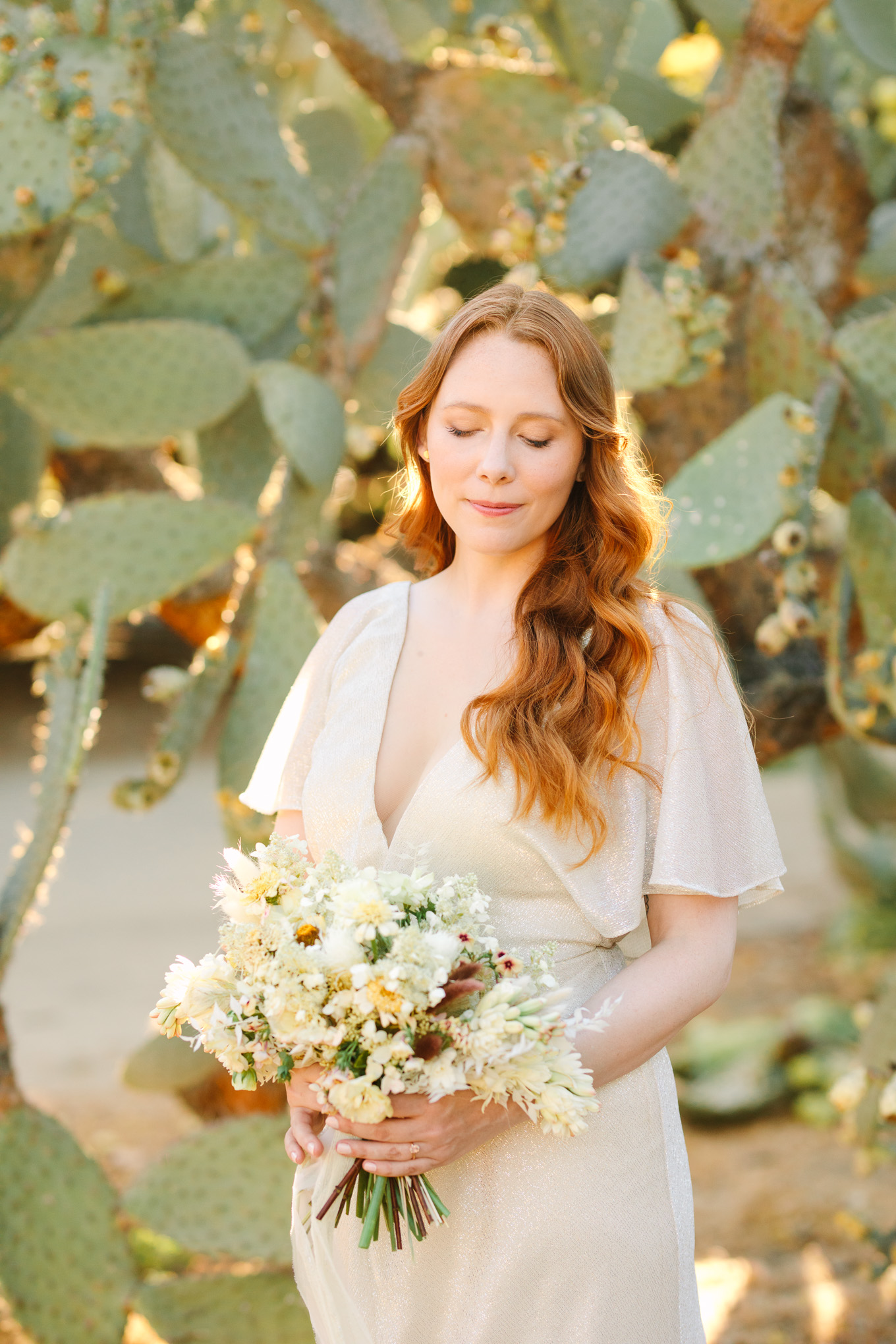 Bride in LA Arboretum cactus garden | Best Southern California Garden Wedding Venues | Colorful and elevated wedding photography for fun-loving couples | #gardenvenue #weddingvenue #socalweddingvenue #bouquetideas #uniquebouquet   Source: Mary Costa Photography | Los Angeles 