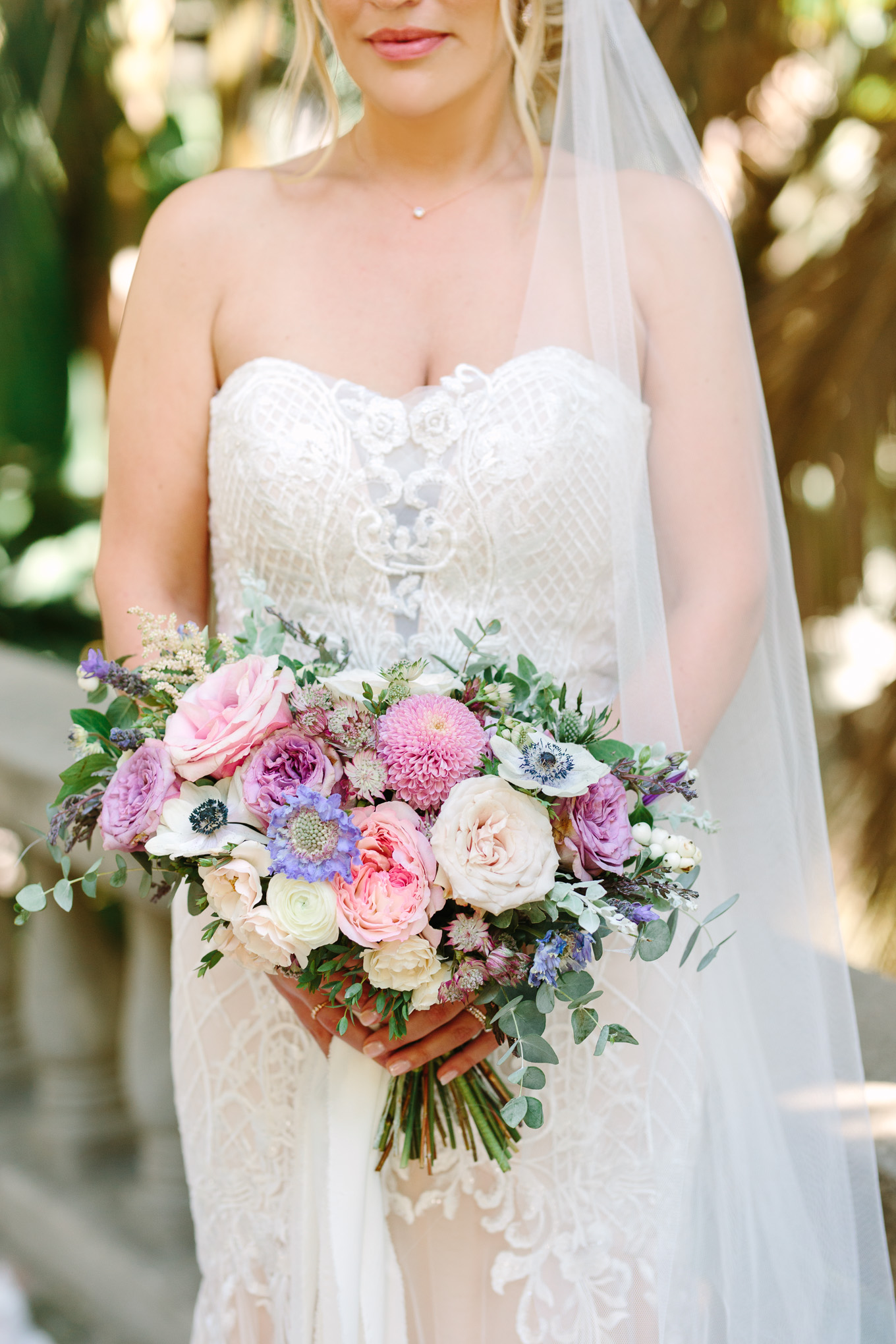 Bride with lavender and pink bouquet at Houdini Estate wedding | Best Southern California Garden Wedding Venues | Colorful and elevated wedding photography for fun-loving couples | #gardenvenue #weddingvenue #socalweddingvenue #bouquetideas #uniquebouquet   Source: Mary Costa Photography | Los Angeles 