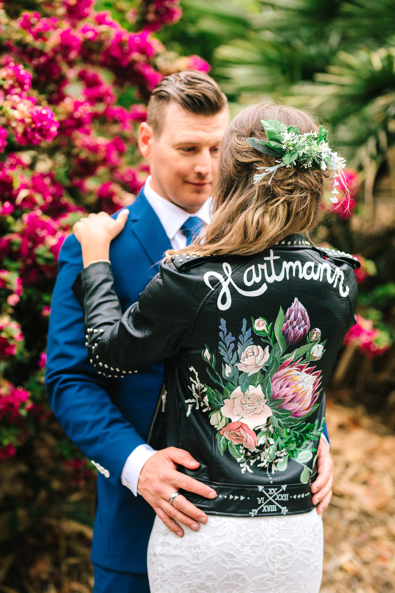 Bride in painted leather jacket at San Diego Botanic Garden wedding | Best Southern California Garden Wedding Venues | Colorful and elevated wedding photography for fun-loving couples | #gardenvenue #weddingvenue #socalweddingvenue #bouquetideas #uniquebouquet   Source: Mary Costa Photography | Los Angeles 