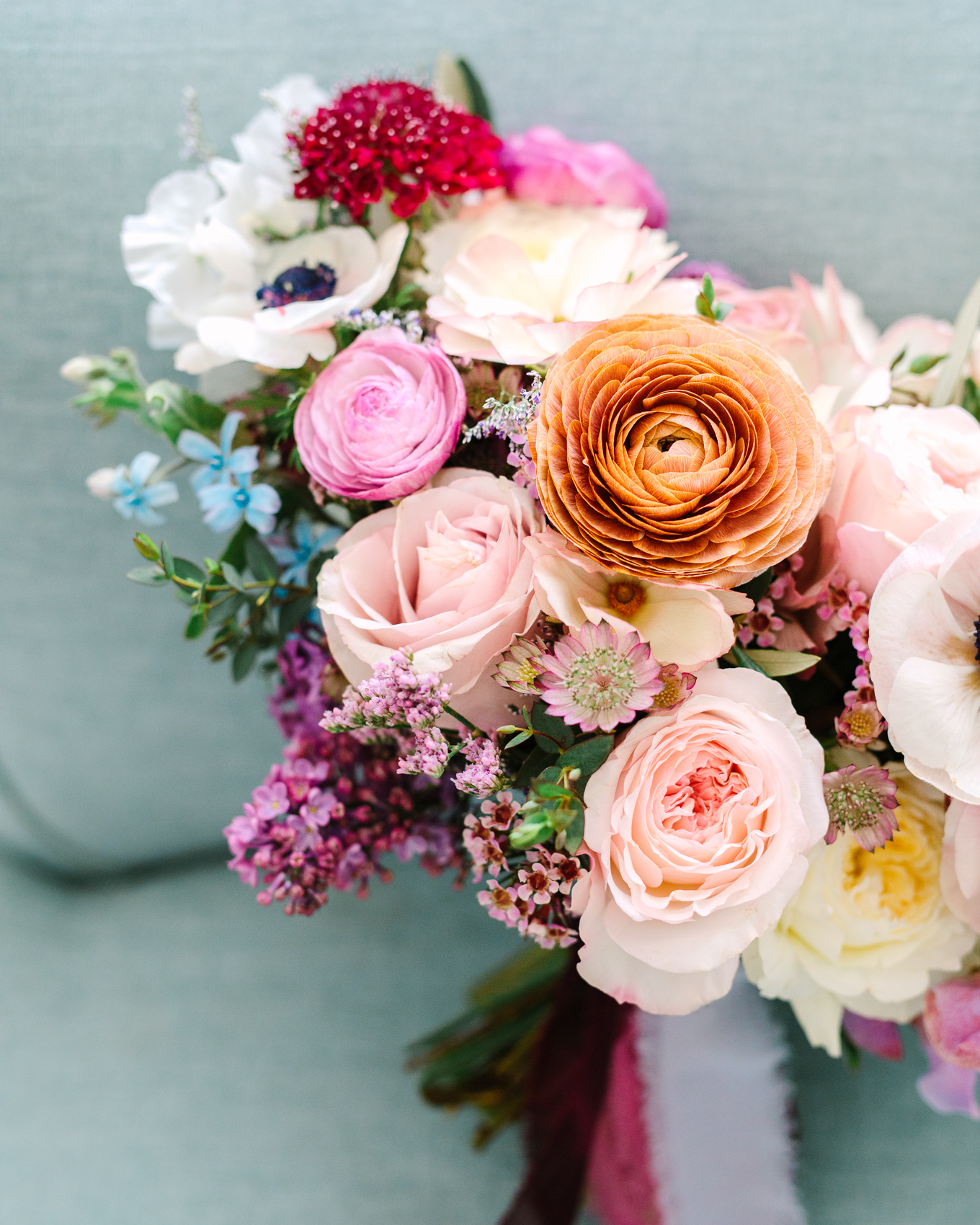 Spring bouquet with ranunculus and garden roses | Beautiful bridal bouquet inspiration and advice | Colorful and elevated wedding photography for fun-loving couples in Southern California | #weddingflowers #weddingbouquet #bridebouquet #bouquetideas #uniquebouquet   Source: Mary Costa Photography | Los Angeles