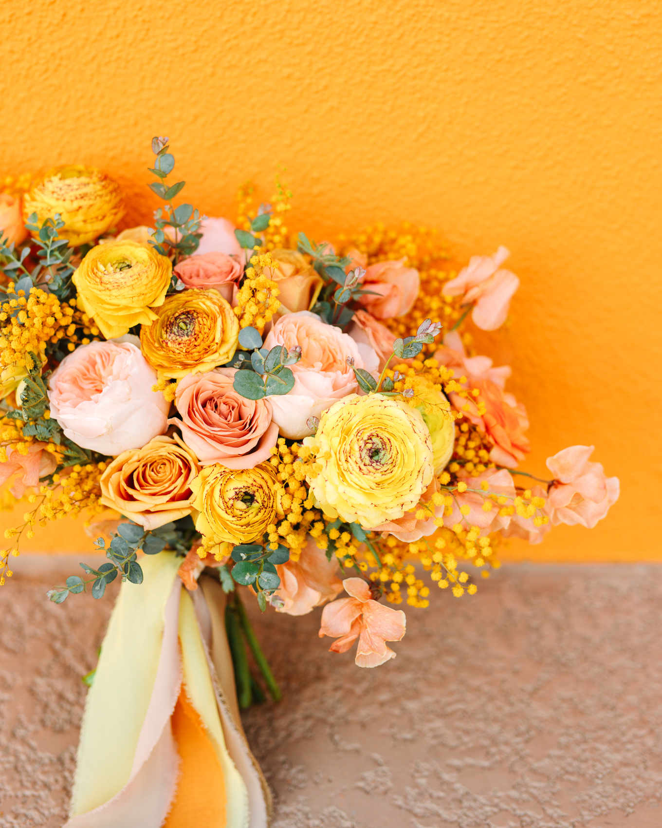Mustard yellow and peach wedding bouquet | Beautiful bridal bouquet inspiration and advice | Colorful and elevated wedding photography for fun-loving couples in Southern California | #weddingflowers #weddingbouquet #bridebouquet #bouquetideas #uniquebouquet   Source: Mary Costa Photography | Los Angeles