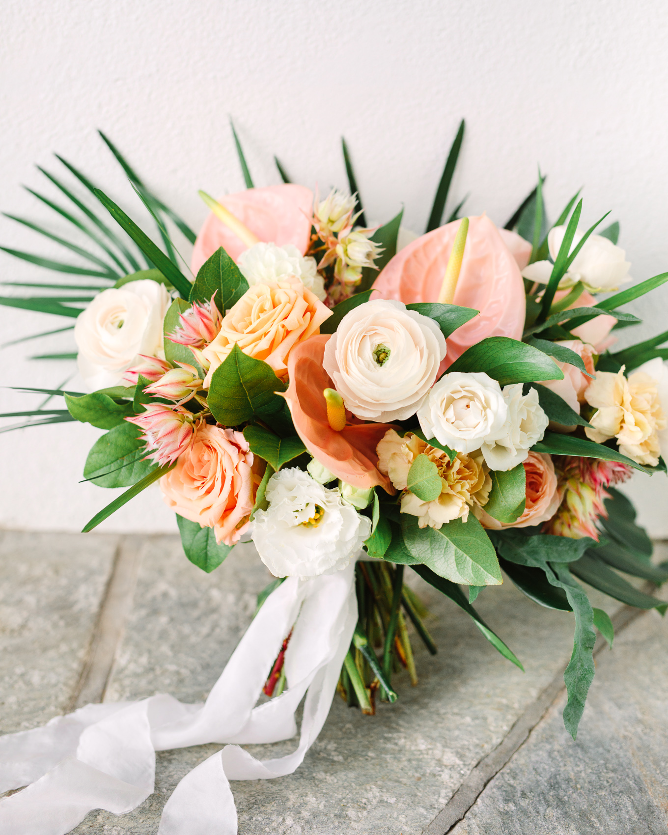 Neutral and peach tropical wedding flowers | Beautiful bridal bouquet inspiration and advice | Colorful and elevated wedding photography for fun-loving couples in Southern California | #weddingflowers #weddingbouquet #bridebouquet #bouquetideas #uniquebouquet   Source: Mary Costa Photography | Los Angeles