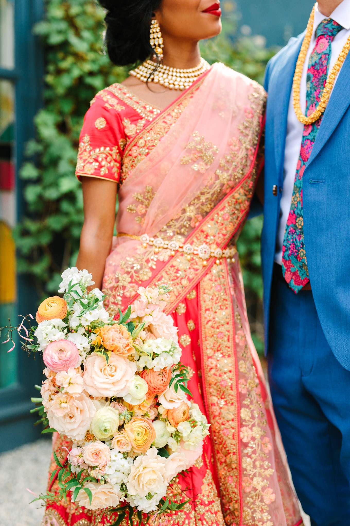 Pink, peach, and white bridal bouquet by The Little Branch. Two Disney artists create a unique and colorful Indian Fusion wedding at The Fig House Los Angeles, featured on Green Wedding Shoes. | Colorful and elevated wedding inspiration for fun-loving couples in Southern California | #indianwedding #indianfusionwedding #thefighouse #losangeleswedding   Source: Mary Costa Photography | Los Angeles