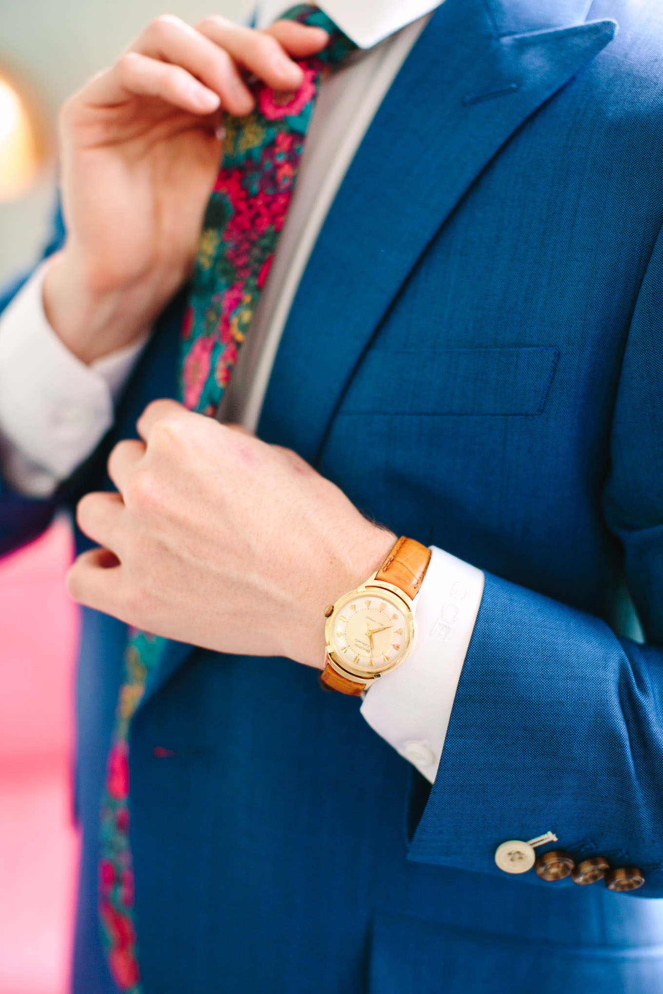 Groom gold watch detail. Two Disney artists create a unique and colorful Indian Fusion wedding at The Fig House Los Angeles, featured on Green Wedding Shoes. | Colorful and elevated wedding inspiration for fun-loving couples in Southern California | #indianwedding #indianfusionwedding #thefighouse #losangeleswedding   Source: Mary Costa Photography | Los Angeles