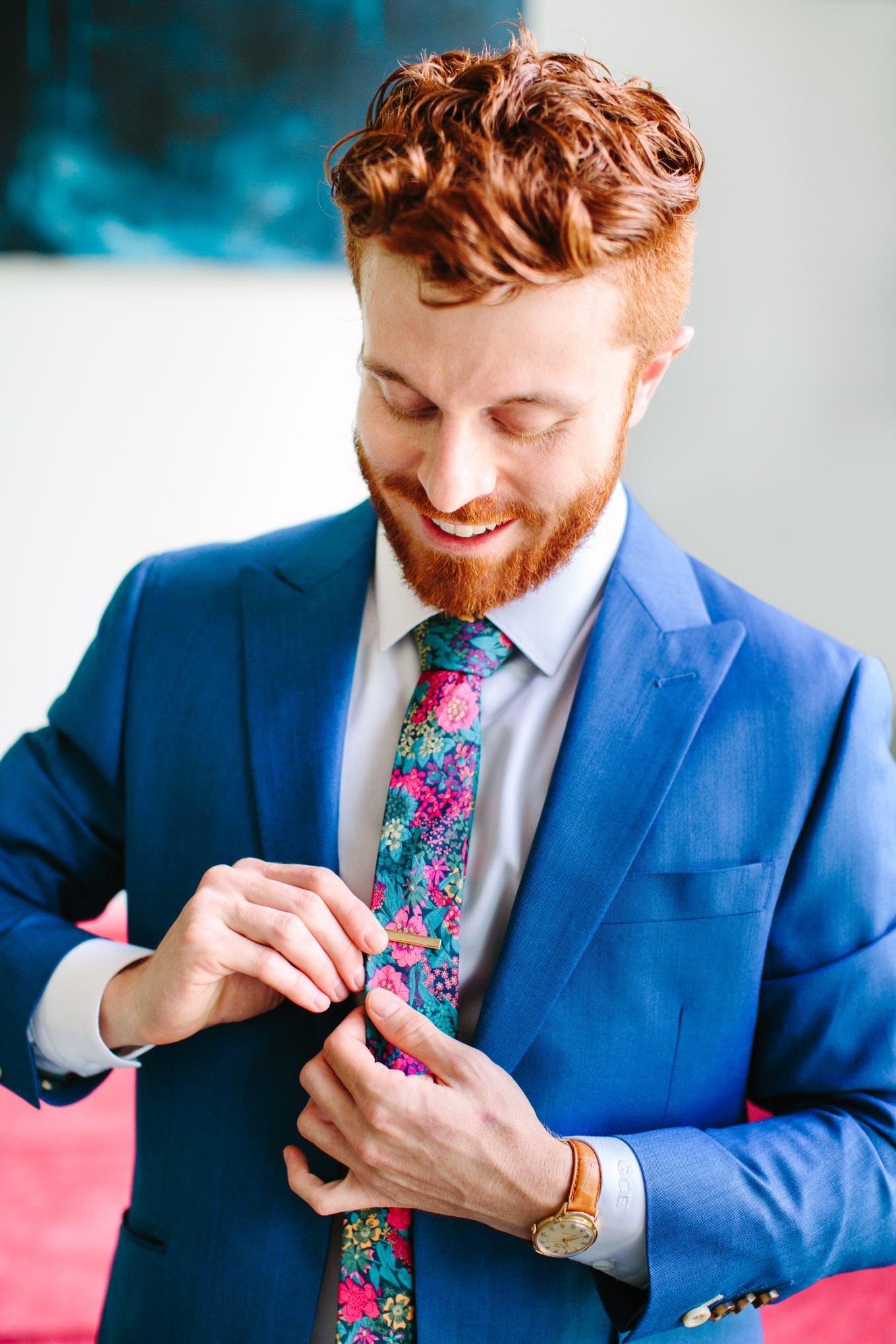 Groom in colorful tie from OTAA. Two Disney artists create a unique and colorful Indian Fusion wedding at The Fig House Los Angeles, featured on Green Wedding Shoes. | Colorful and elevated wedding inspiration for fun-loving couples in Southern California | #indianwedding #indianfusionwedding #thefighouse #losangeleswedding   Source: Mary Costa Photography | Los Angeles