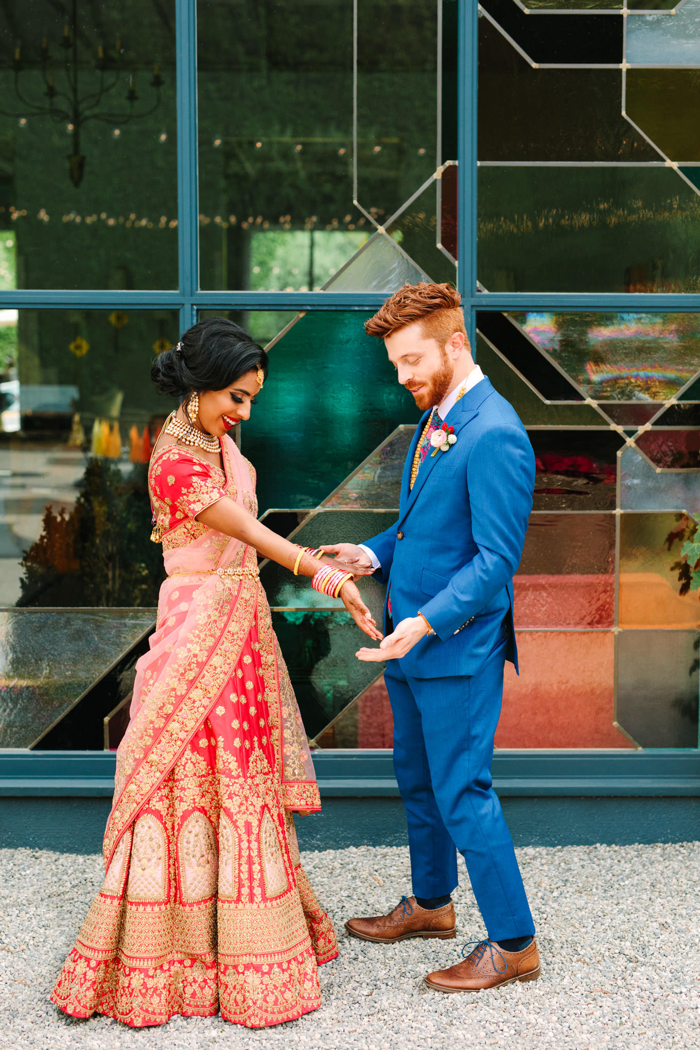 Bride showing henna tattoo during first look. Two Disney artists create a unique and colorful Indian Fusion wedding at The Fig House Los Angeles, featured on Green Wedding Shoes. | Colorful and elevated wedding inspiration for fun-loving couples in Southern California | #indianwedding #indianfusionwedding #thefighouse #losangeleswedding   Source: Mary Costa Photography | Los Angeles