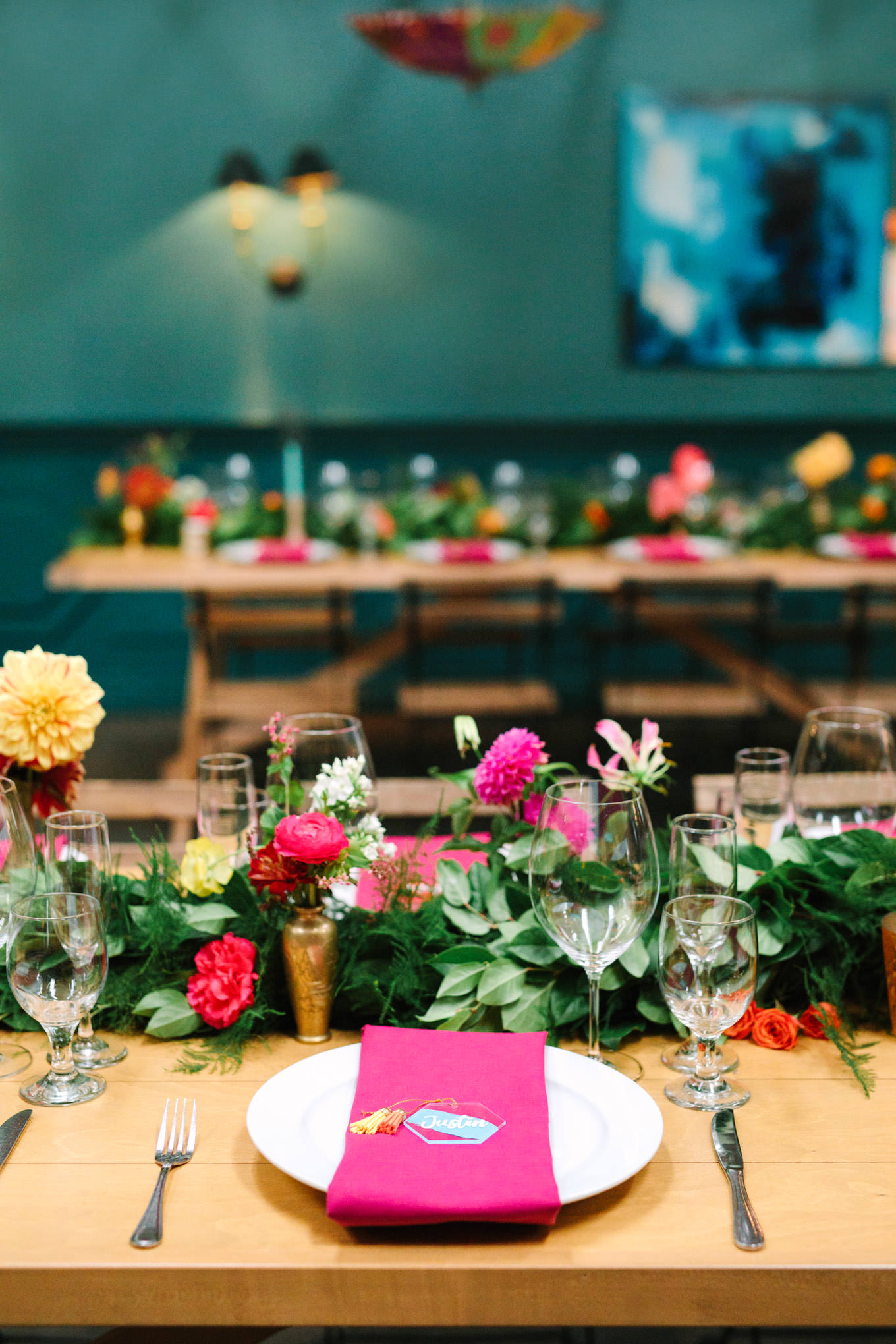 Colorful table at wedding reception. Two Disney artists create a unique and colorful Indian Fusion wedding at The Fig House Los Angeles, featured on Green Wedding Shoes. | Colorful and elevated wedding inspiration for fun-loving couples in Southern California | #indianwedding #indianfusionwedding #thefighouse #losangeleswedding   Source: Mary Costa Photography | Los Angeles