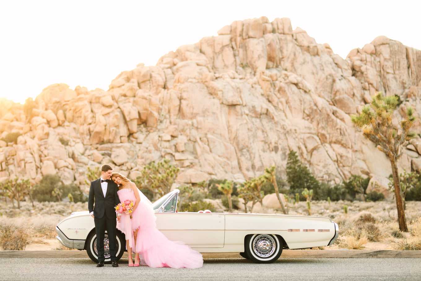 Joshua Tree pink dress elopement with classic car | Engagement, elopement, and wedding photography roundup of Mary Costa’s favorite images from 2020 | Colorful and elevated photography for fun-loving couples in Southern California | #2020wedding #elopement #weddingphoto #weddingphotography   Source: Mary Costa Photography | Los Angeles
