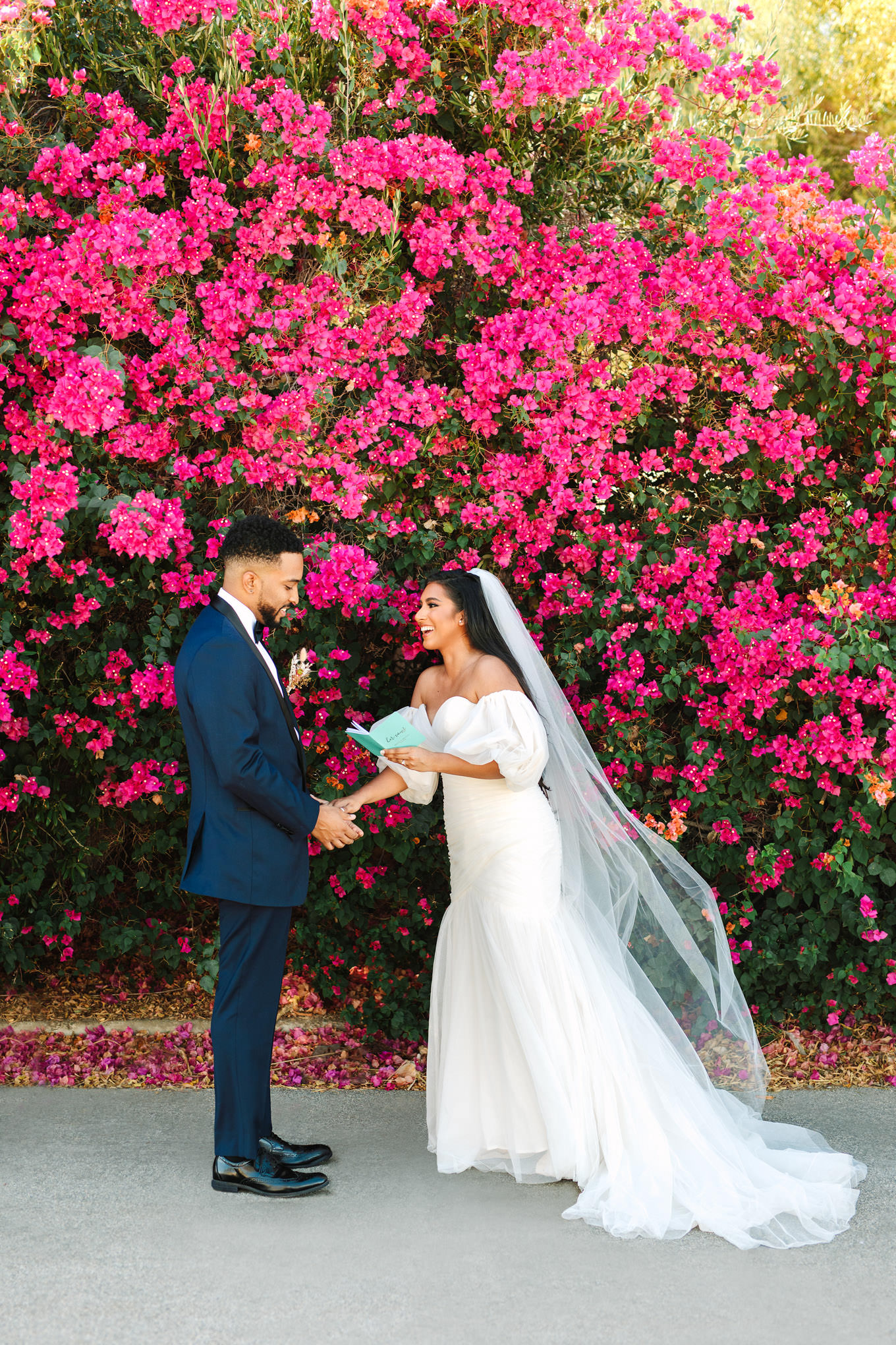 Palm Springs vow exchange in front of bougainvillea | Engagement, elopement, and wedding photography roundup of Mary Costa’s favorite images from 2020 | Colorful and elevated photography for fun-loving couples in Southern California | #2020wedding #elopement #weddingphoto #weddingphotography #microwedding   Source: Mary Costa Photography | Los Angeles