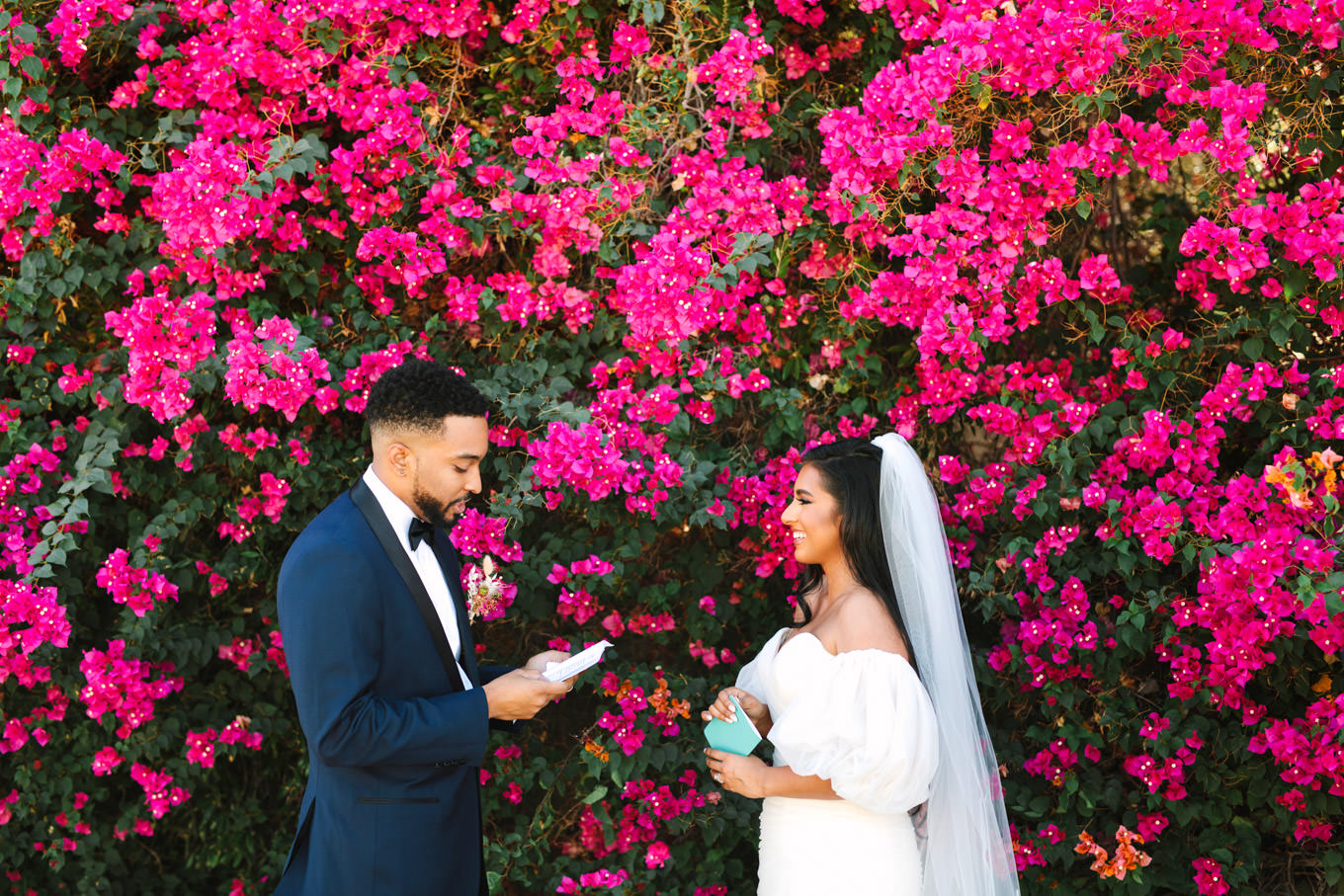 Vow exchange in front of bougainvillea | Engagement, elopement, and wedding photography roundup of Mary Costa’s favorite images from 2020 | Colorful and elevated photography for fun-loving couples in Southern California | #2020wedding #elopement #weddingphoto #weddingphotography #microwedding   Source: Mary Costa Photography | Los Angeles