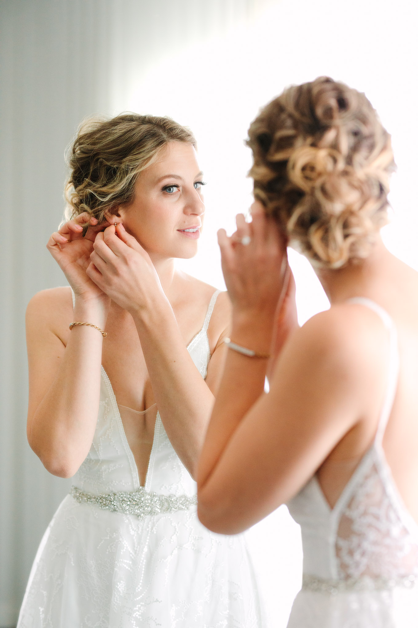 Bride getting ready | Living Desert Zoo & Gardens wedding with unique details | Elevated and colorful wedding photography for fun-loving couples in Southern California |  #PalmSprings #palmspringsphotographer #gardenwedding #palmspringswedding  Source: Mary Costa Photography | Los Angeles wedding photographer 