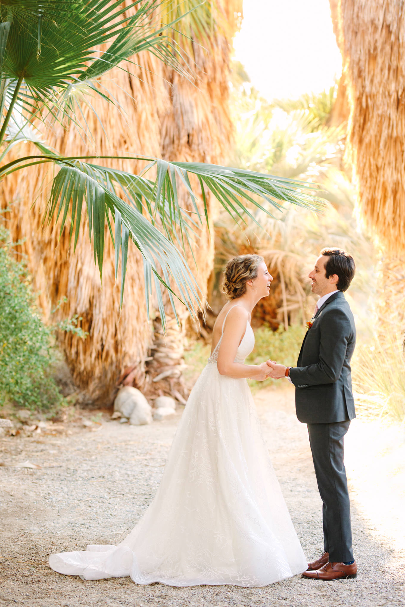 Bride and groom first look in palm garden | Living Desert Zoo & Gardens wedding with unique details | Elevated and colorful wedding photography for fun-loving couples in Southern California |  #PalmSprings #palmspringsphotographer #gardenwedding #palmspringswedding  Source: Mary Costa Photography | Los Angeles wedding photographer 