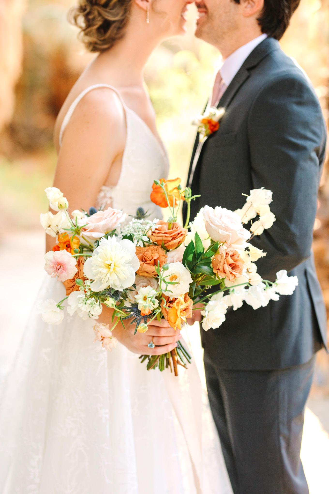 Colorful wedding bouquet detail | Living Desert Zoo & Gardens wedding with unique details | Elevated and colorful wedding photography for fun-loving couples in Southern California |  #PalmSprings #palmspringsphotographer #gardenwedding #palmspringswedding  Source: Mary Costa Photography | Los Angeles wedding photographer 