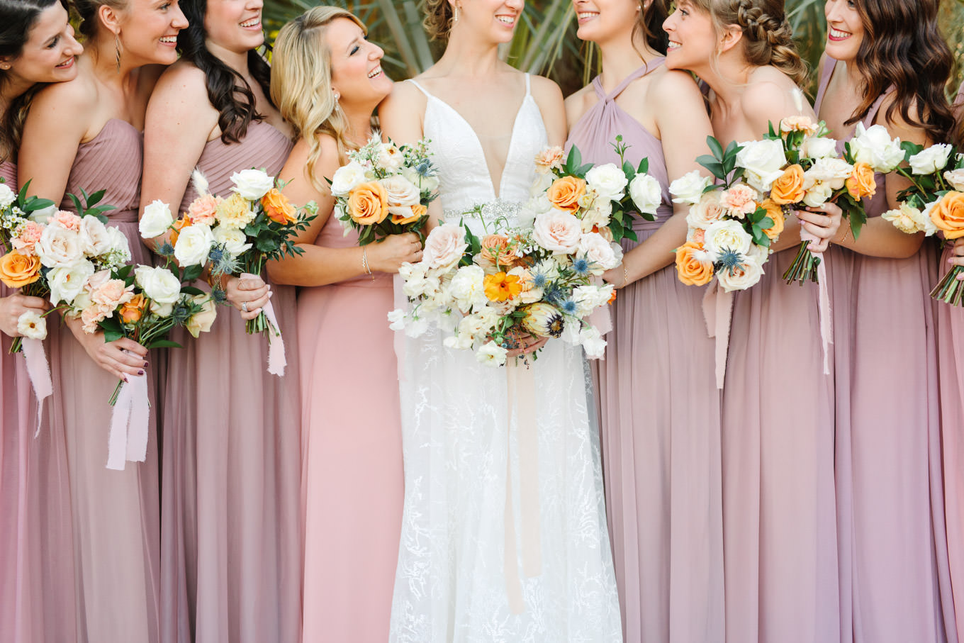 Bridesmaids in mismatched blush and mauve dresses | Living Desert Zoo & Gardens wedding with unique details | Elevated and colorful wedding photography for fun-loving couples in Southern California |  #PalmSprings #palmspringsphotographer #gardenwedding #palmspringswedding  Source: Mary Costa Photography | Los Angeles wedding photographer 