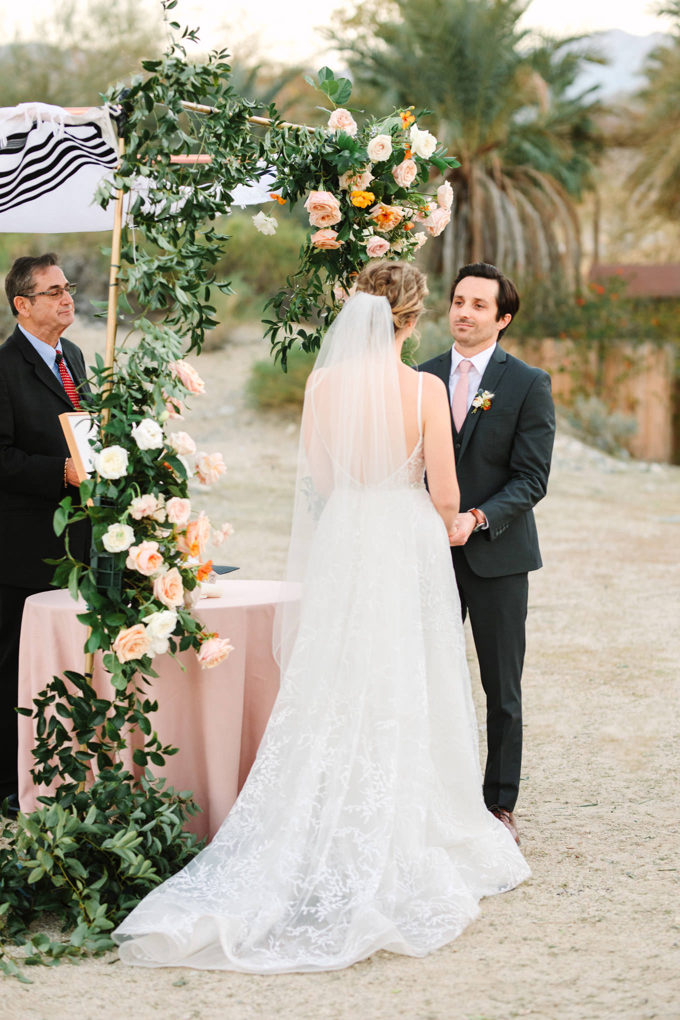 Bride and groom during wedding ceremony | Living Desert Zoo & Gardens wedding with unique details | Elevated and colorful wedding photography for fun-loving couples in Southern California |  #PalmSprings #palmspringsphotographer #gardenwedding #palmspringswedding  Source: Mary Costa Photography | Los Angeles wedding photographer 