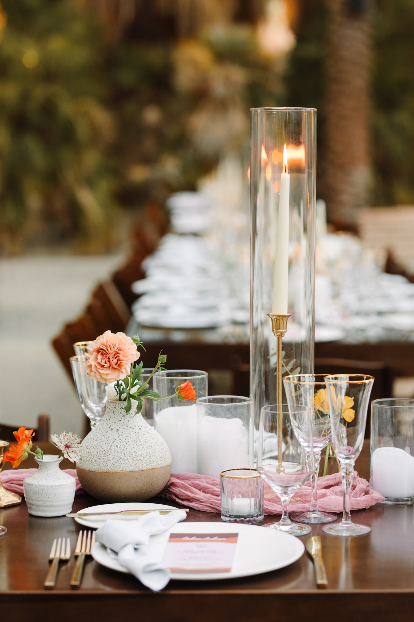 Tall candles and table details at wedding reception | Living Desert Zoo & Gardens wedding with unique details | Elevated and colorful wedding photography for fun-loving couples in Southern California |  #PalmSprings #palmspringsphotographer #gardenwedding #palmspringswedding  Source: Mary Costa Photography | Los Angeles wedding photographer 