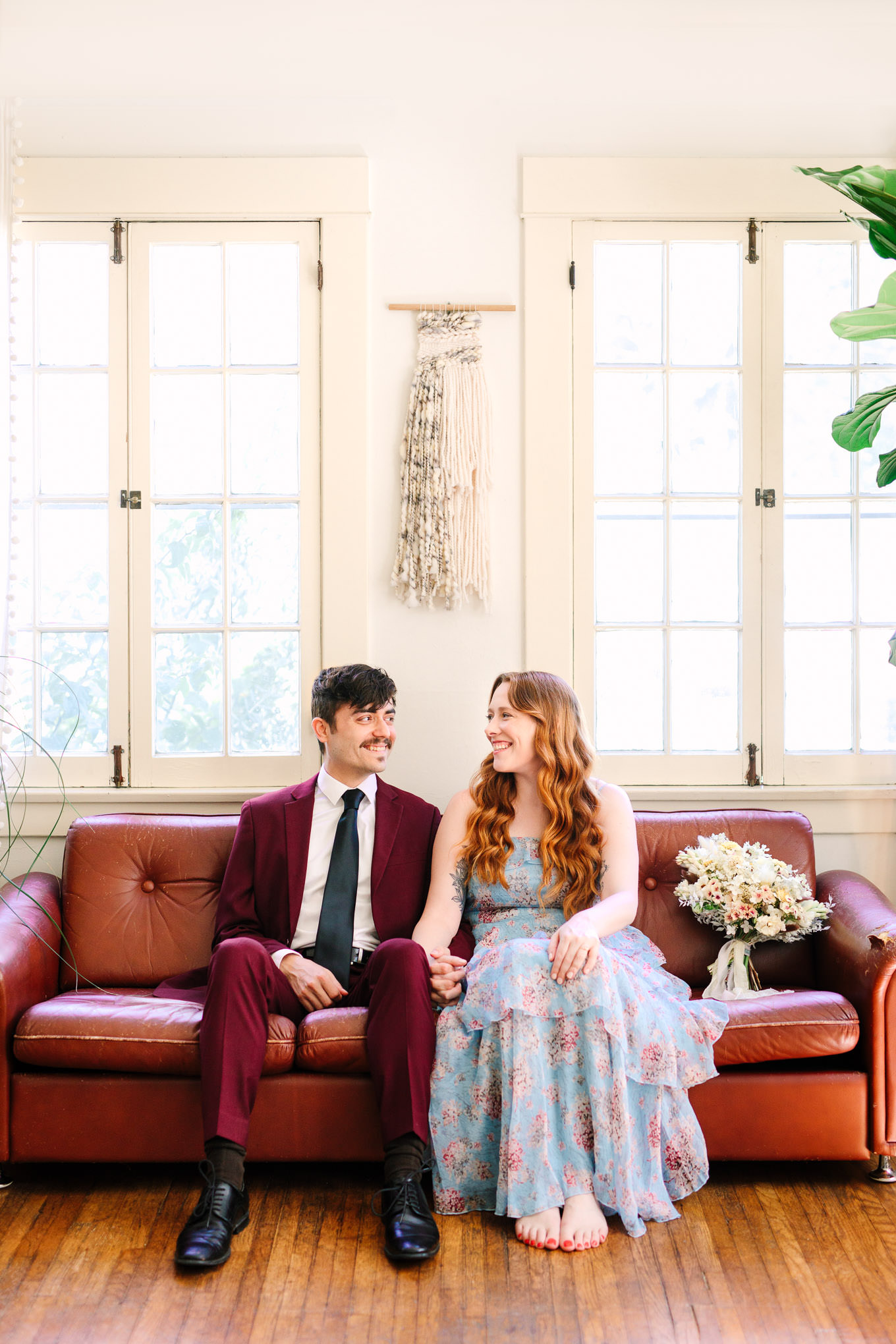 Engagement photos at home on the couch | Los Angeles Arboretum Elopement | Colorful and elevated wedding photography for fun-loving couples in Southern California | #LosAngelesElopement #elopement #LAarboretum #LAskyline #elopementphotos   Source: Mary Costa Photography | Los Angeles