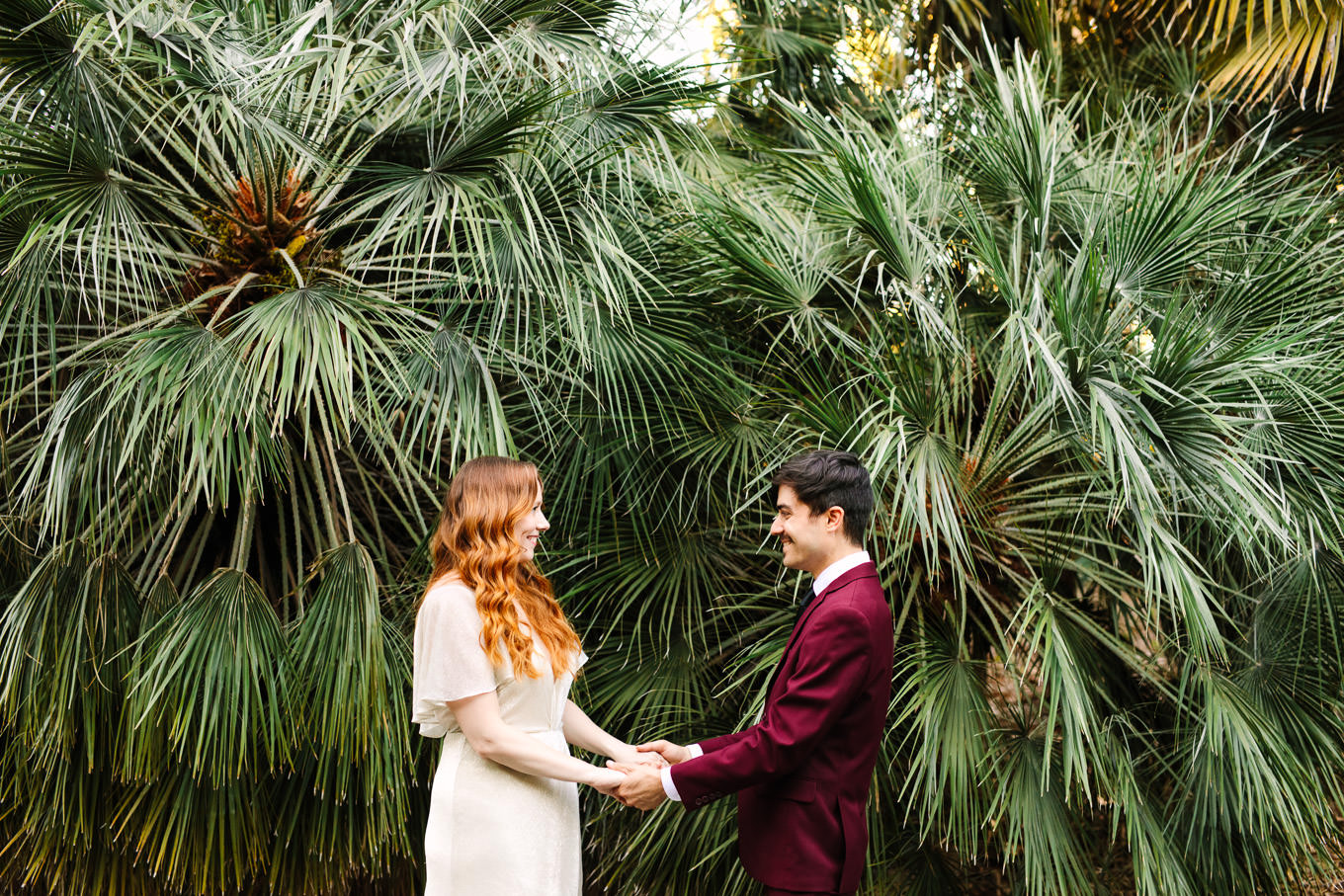 Elopement portrait in front of palms | Los Angeles Arboretum Elopement | Colorful and elevated wedding photography for fun-loving couples in Southern California | #LosAngelesElopement #elopement #LAarboretum #LAskyline #elopementphotos   Source: Mary Costa Photography | Los Angeles