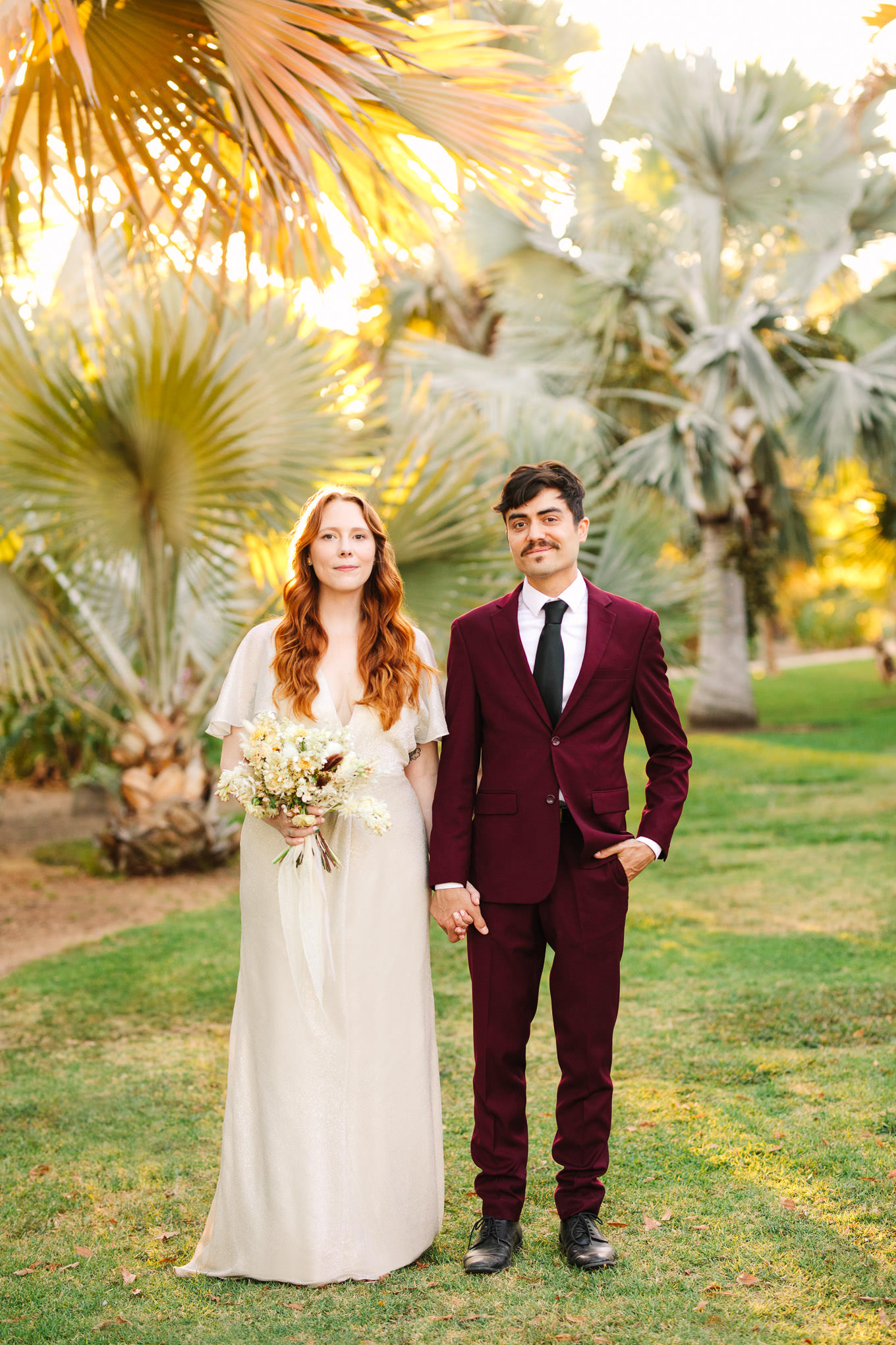Elopement portrait in palm garden | Los Angeles Arboretum Elopement | Colorful and elevated wedding photography for fun-loving couples in Southern California | #LosAngelesElopement #elopement #LAarboretum #LAskyline #elopementphotos   Source: Mary Costa Photography | Los Angeles