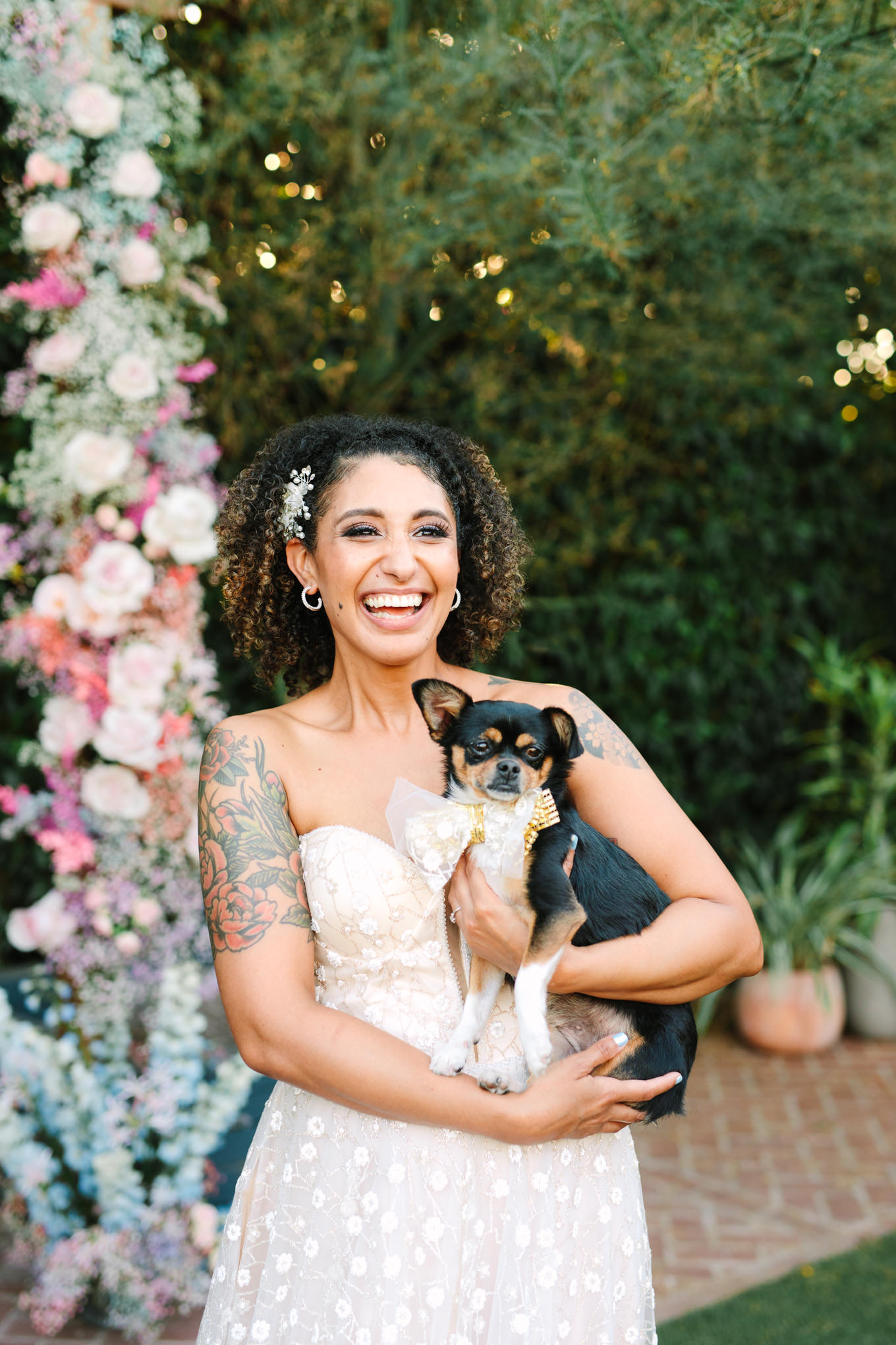 Bride with puppy | Colorful pop-up micro wedding at The Ruby Street Los Angeles featured on Green Wedding Shoes | Colorful and elevated photography for fun-loving couples in Southern California | #colorfulwedding #popupwedding #weddingphotography #microwedding Source: Mary Costa Photography | Los Angeles
