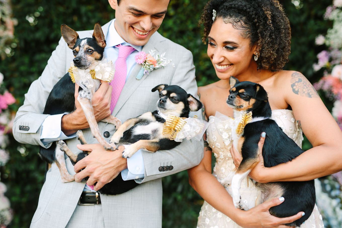 Bride and groom with three dogs | Colorful pop-up micro wedding at The Ruby Street Los Angeles featured on Green Wedding Shoes | Colorful and elevated photography for fun-loving couples in Southern California | #colorfulwedding #popupwedding #weddingphotography #microwedding Source: Mary Costa Photography | Los Angeles