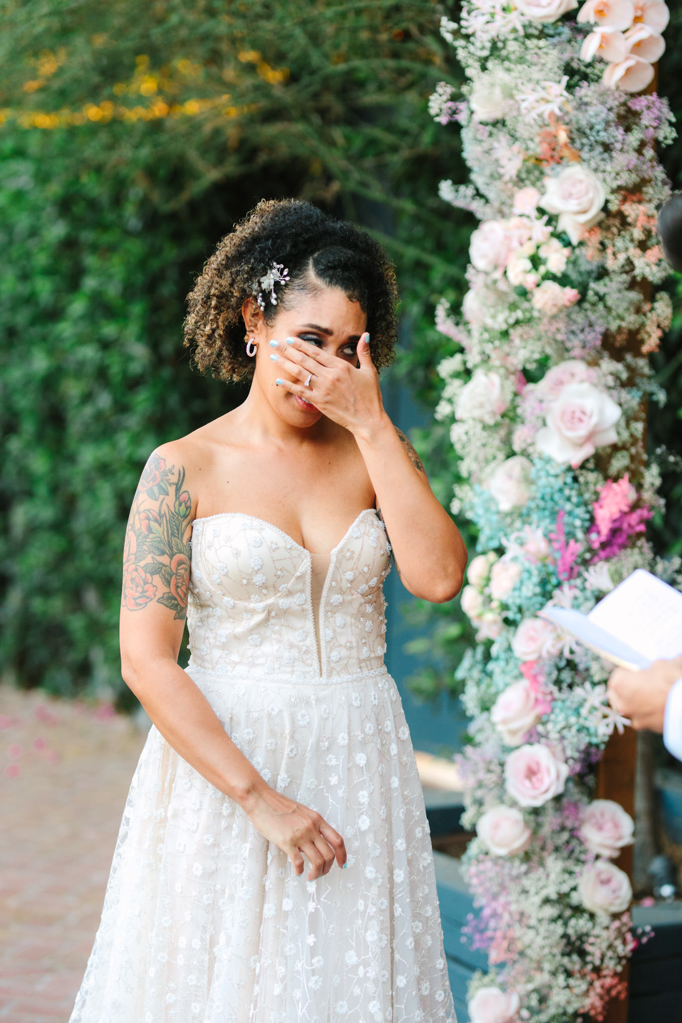 Bride crying at wedding ceremony | Colorful pop-up micro wedding at The Ruby Street Los Angeles featured on Green Wedding Shoes | Colorful and elevated photography for fun-loving couples in Southern California | #colorfulwedding #popupwedding #weddingphotography #microwedding Source: Mary Costa Photography | Los Angeles