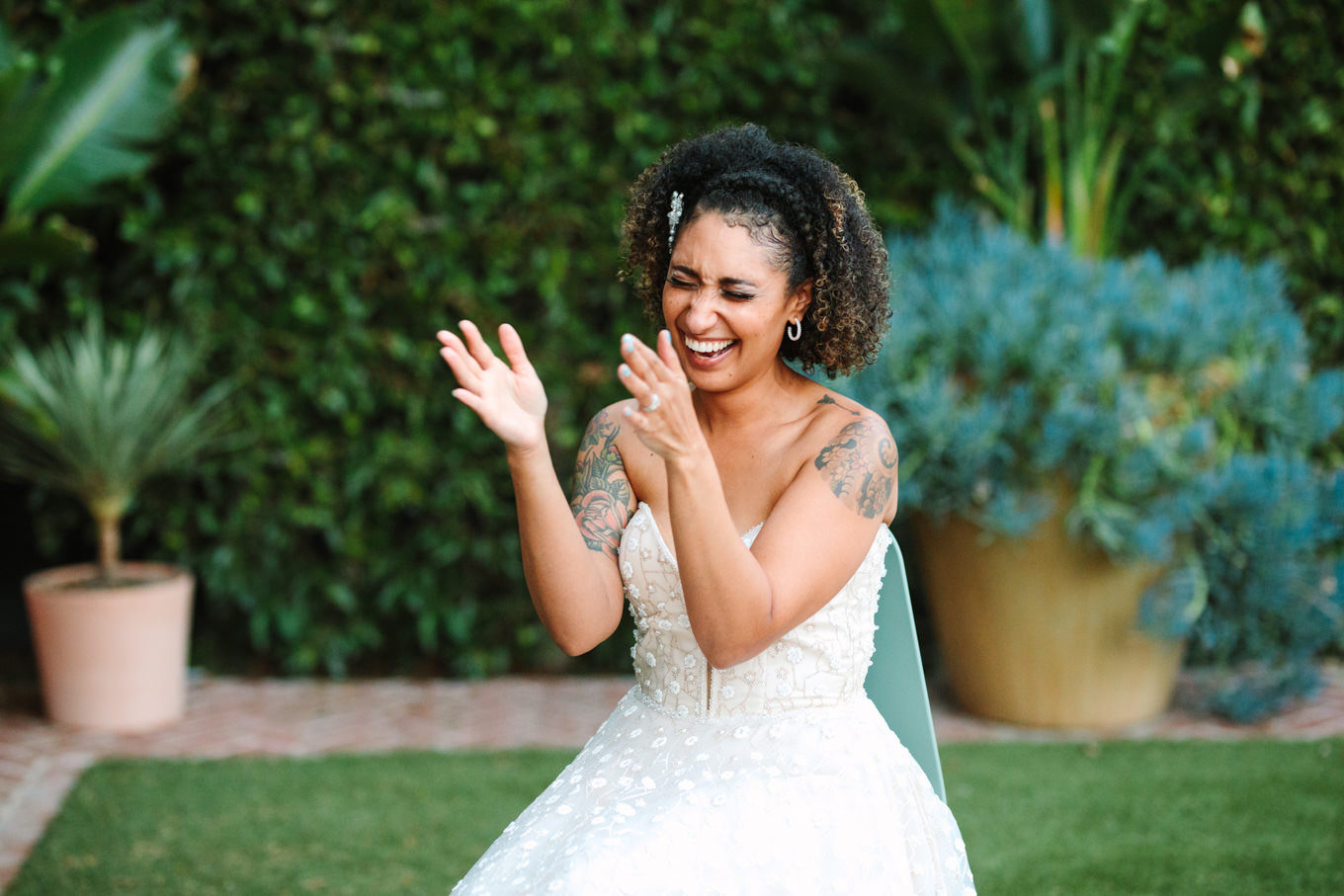 Bride clapping at groom's surprise song performance | Colorful pop-up micro wedding at The Ruby Street Los Angeles featured on Green Wedding Shoes | Colorful and elevated photography for fun-loving couples in Southern California | #colorfulwedding #popupwedding #weddingphotography #microwedding Source: Mary Costa Photography | Los Angeles