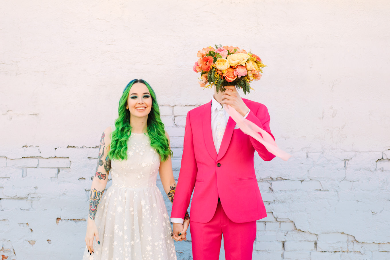 Bride with neon green hair and groom in hot pink suit | Colorful wedding at The Unique Space Los Angeles published in The Knot Magazine | Fresh and colorful photography for fun-loving couples in Southern California | #colorfulwedding #losangeleswedding #weddingphotography #uniquespace Source: Mary Costa Photography | Los Angeles