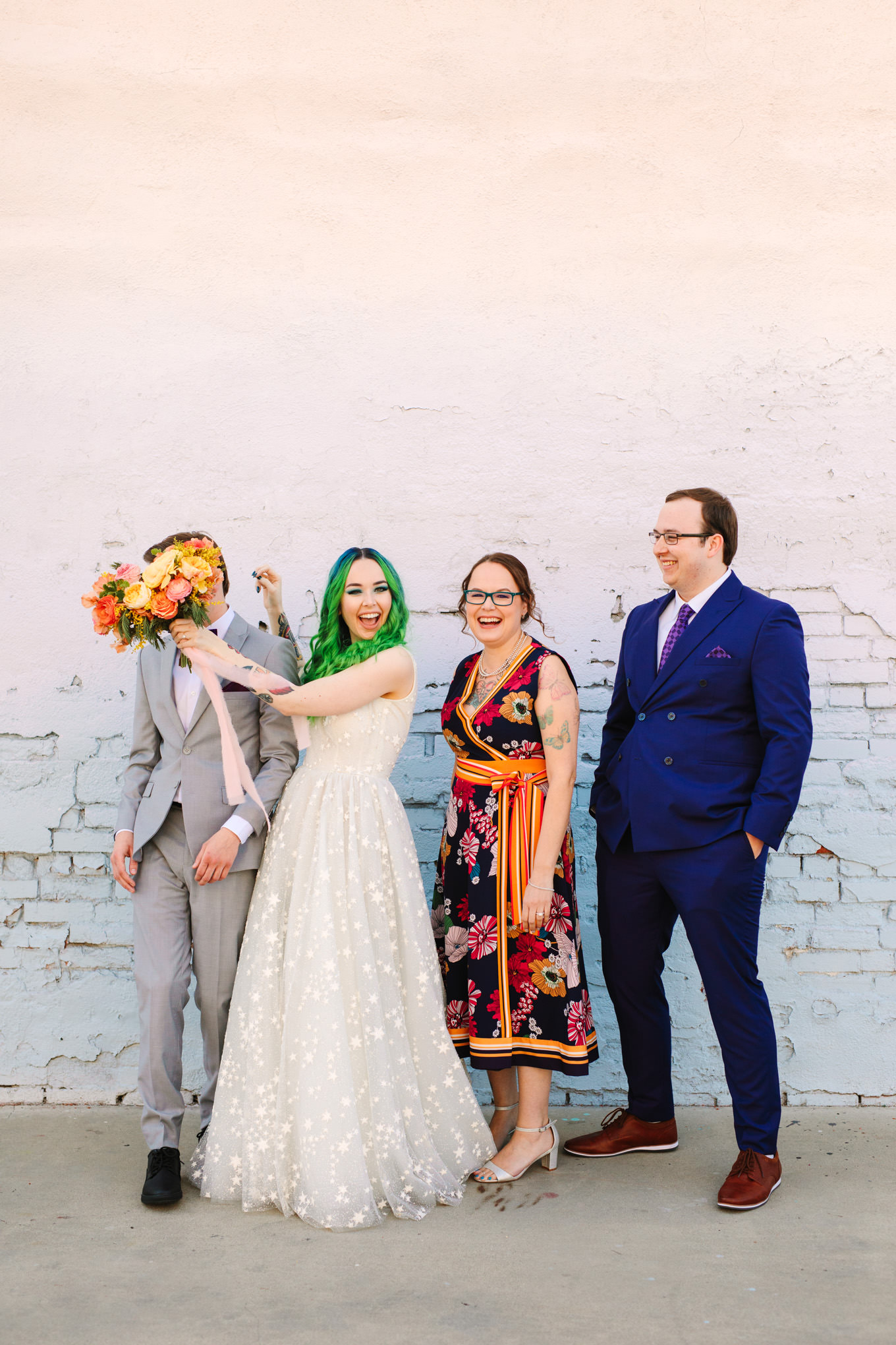 Playful family photo | Colorful wedding at The Unique Space Los Angeles published in The Knot Magazine | Fresh and colorful photography for fun-loving couples in Southern California | #colorfulwedding #losangeleswedding #weddingphotography #uniquespace Source: Mary Costa Photography | Los Angeles