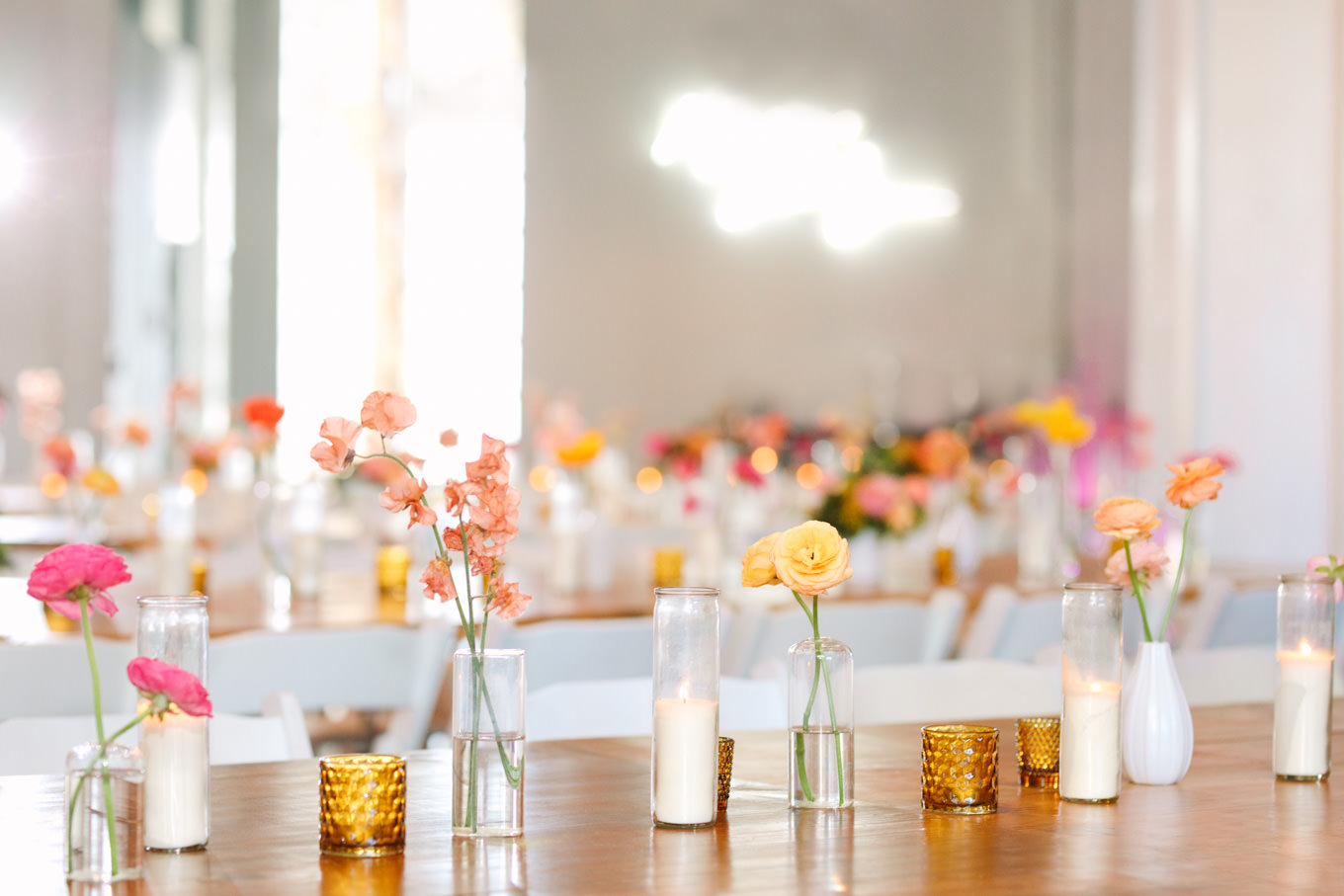 Bud vases at Unique Space | Colorful wedding at The Unique Space Los Angeles published in The Knot Magazine | Fresh and colorful photography for fun-loving couples in Southern California | #colorfulwedding #losangeleswedding #weddingphotography #uniquespace Source: Mary Costa Photography | Los Angeles