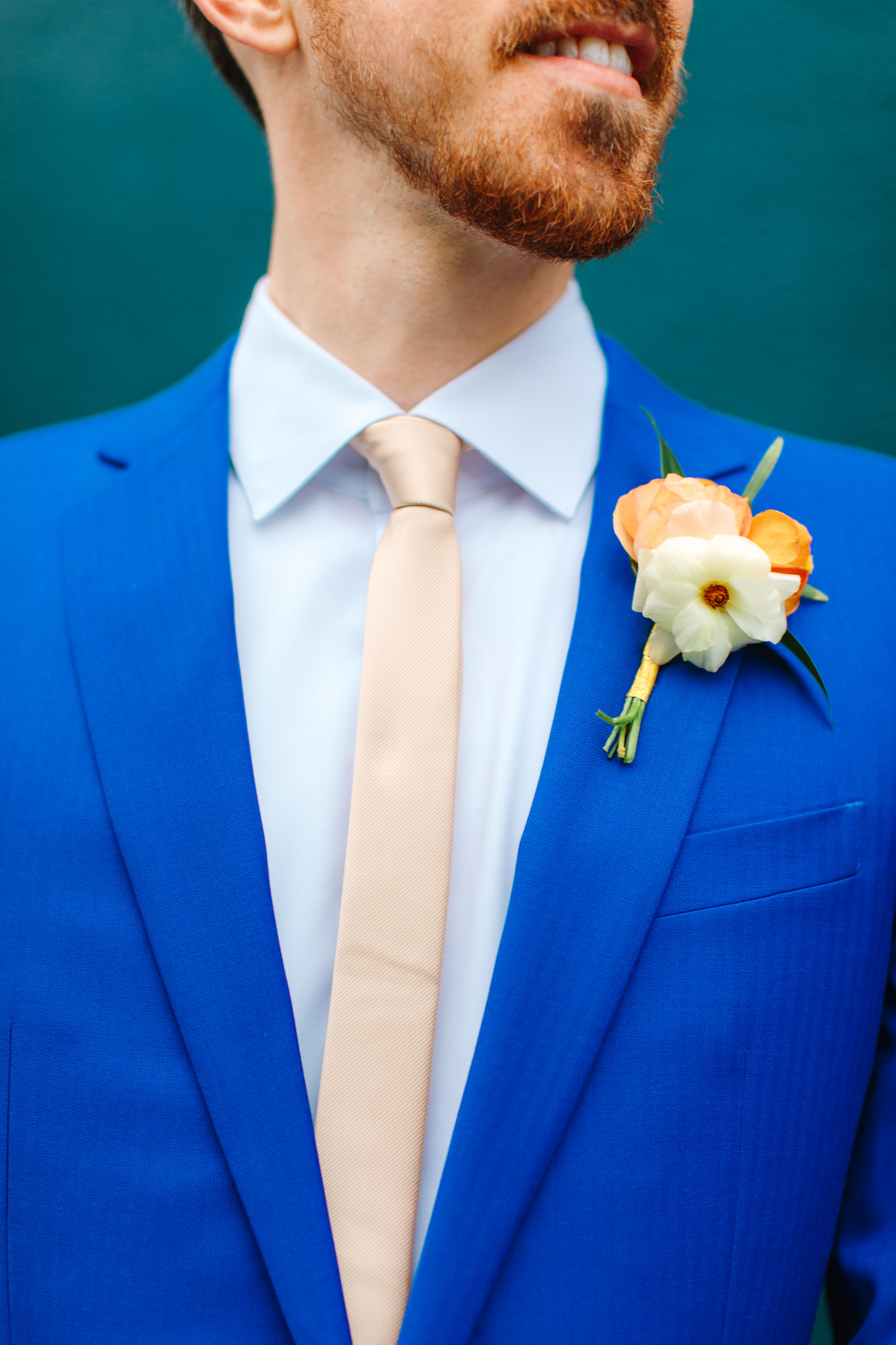 Groom in bright blue suit with ivory tie and orange boutonniere | TV inspired wedding at The Fig House Los Angeles | Published on The Knot | Fresh and colorful photography for fun-loving couples in Southern California | #losangeleswedding #TVwedding #colorfulwedding #theknot   Source: Mary Costa Photography | Los Angeles wedding photographer