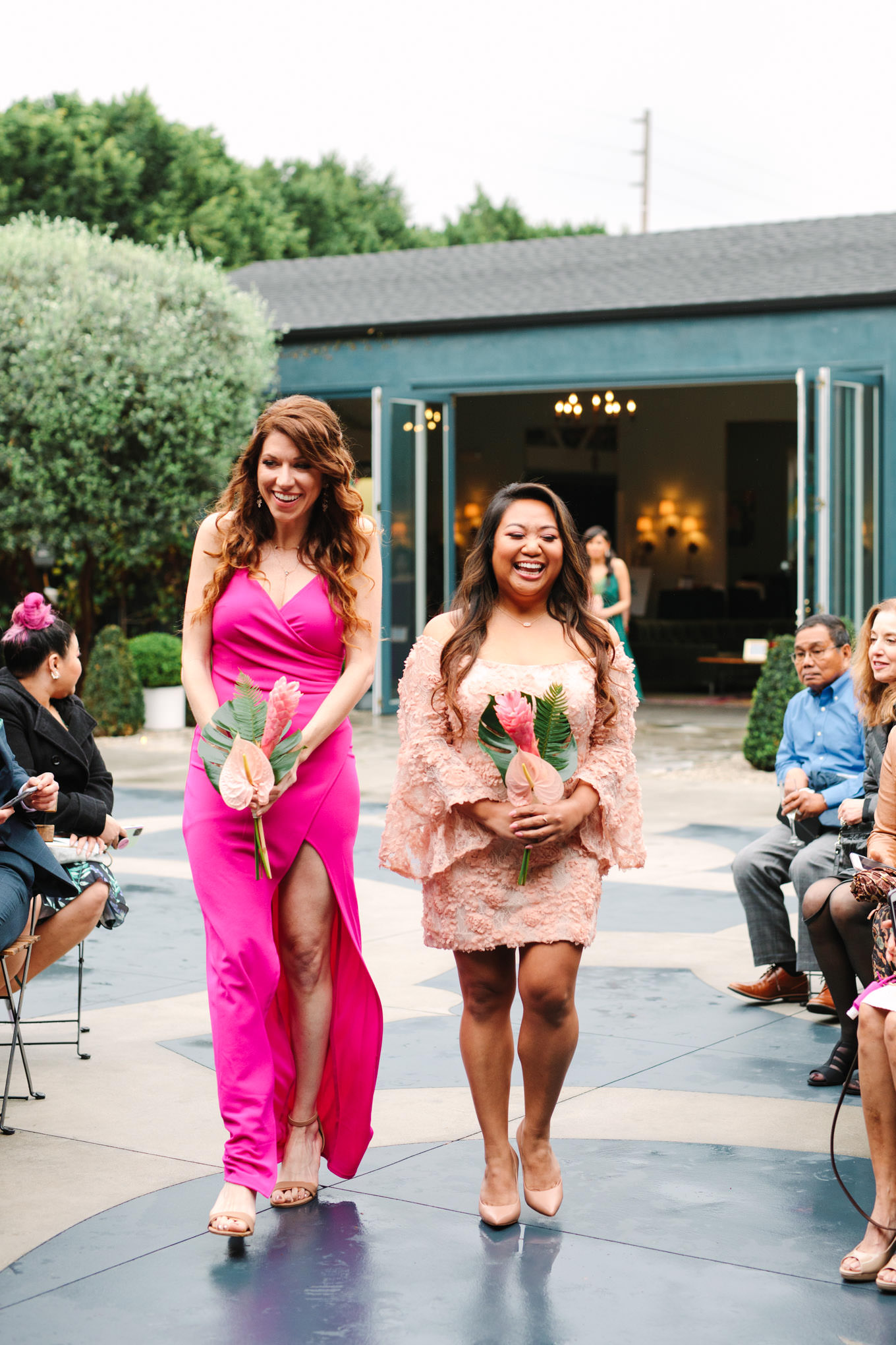 Bridesmaids walking into ceremony together | TV inspired wedding at The Fig House Los Angeles | Published on The Knot | Fresh and colorful photography for fun-loving couples in Southern California | #losangeleswedding #TVwedding #colorfulwedding #theknot   Source: Mary Costa Photography | Los Angeles wedding photographer