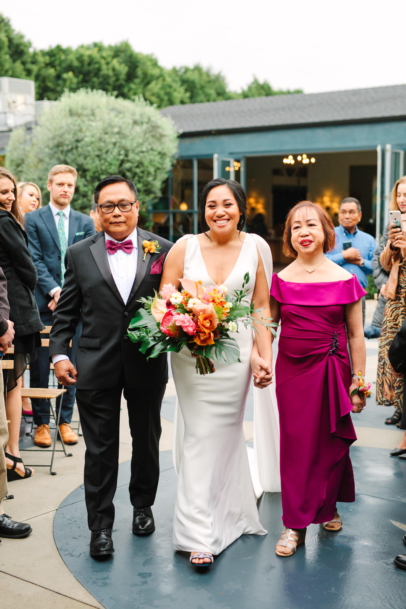 Bride walking down the aisle | TV inspired wedding at The Fig House Los Angeles | Published on The Knot | Fresh and colorful photography for fun-loving couples in Southern California | #losangeleswedding #TVwedding #colorfulwedding #theknot   Source: Mary Costa Photography | Los Angeles wedding photographer